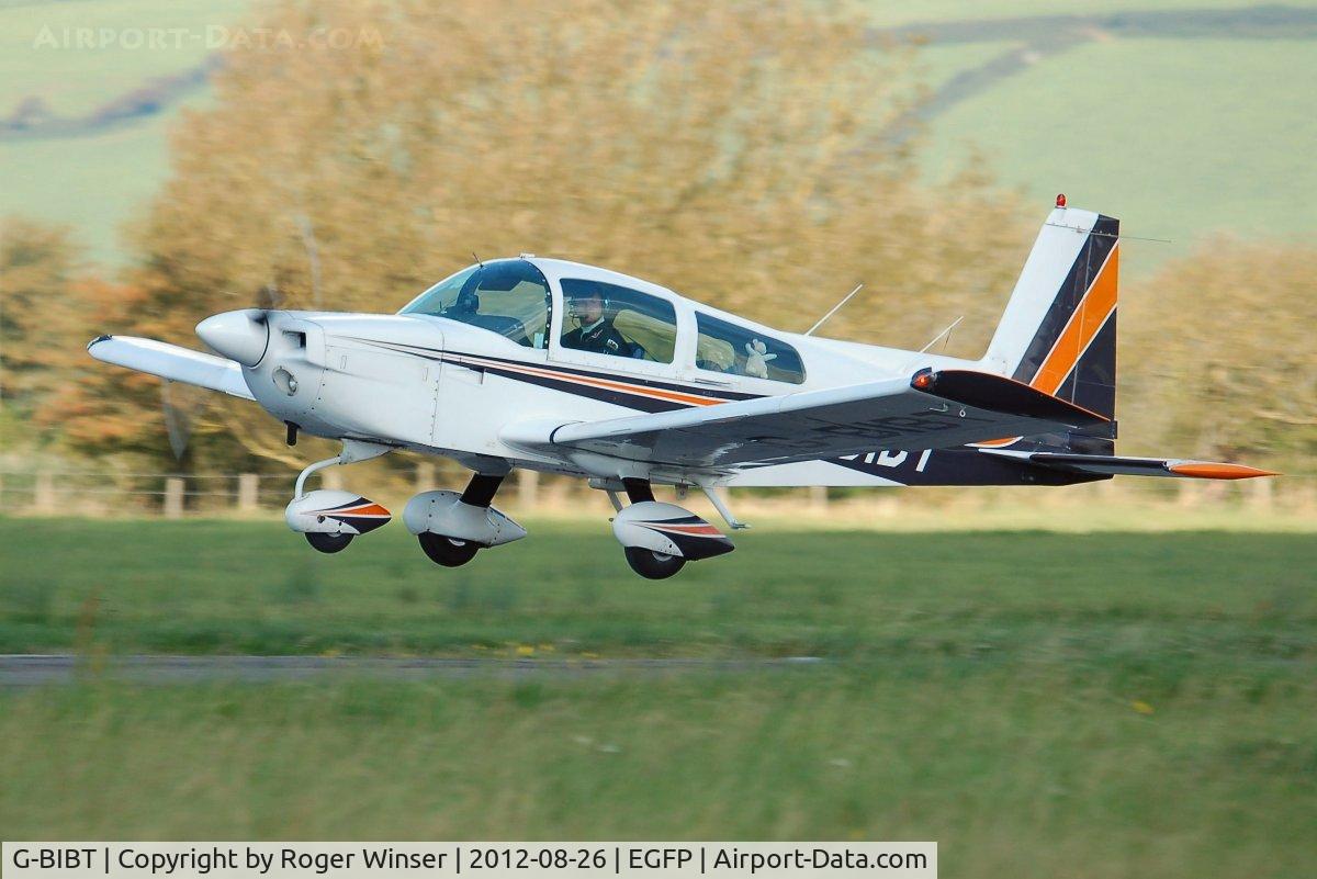 G-BIBT, 1978 Gulfstream American AA-5B Tiger C/N AA5B-1047, Resident Tiger departing Pembrey Airport.