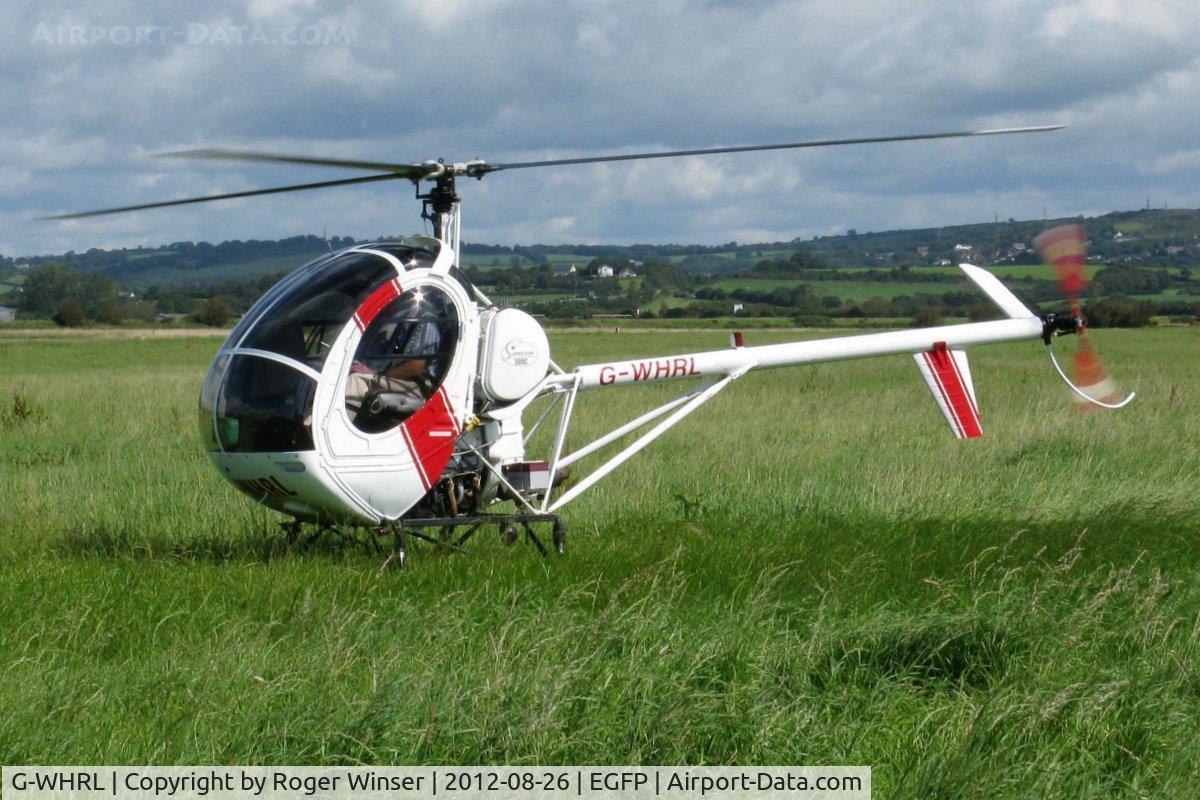 G-WHRL, 1990 Schweizer 269C-300 C/N S-1453, Resident helicopter.