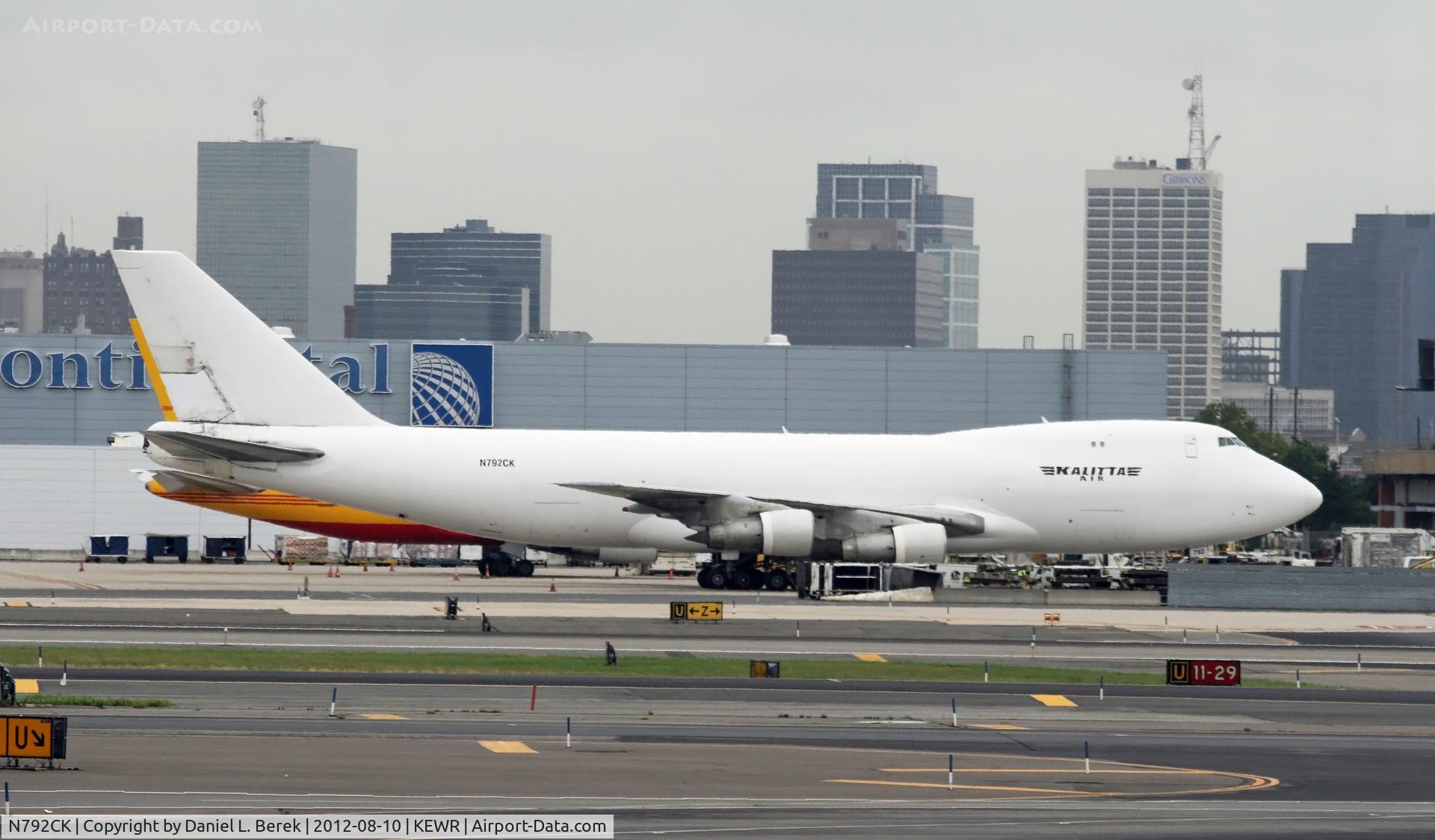 N792CK, 1988 Boeing 747-212F C/N 24177, A 747 classic freighter, more and more a rarity these days, rests on the eastern end of Newark Liberty International, next to a DHL 762.