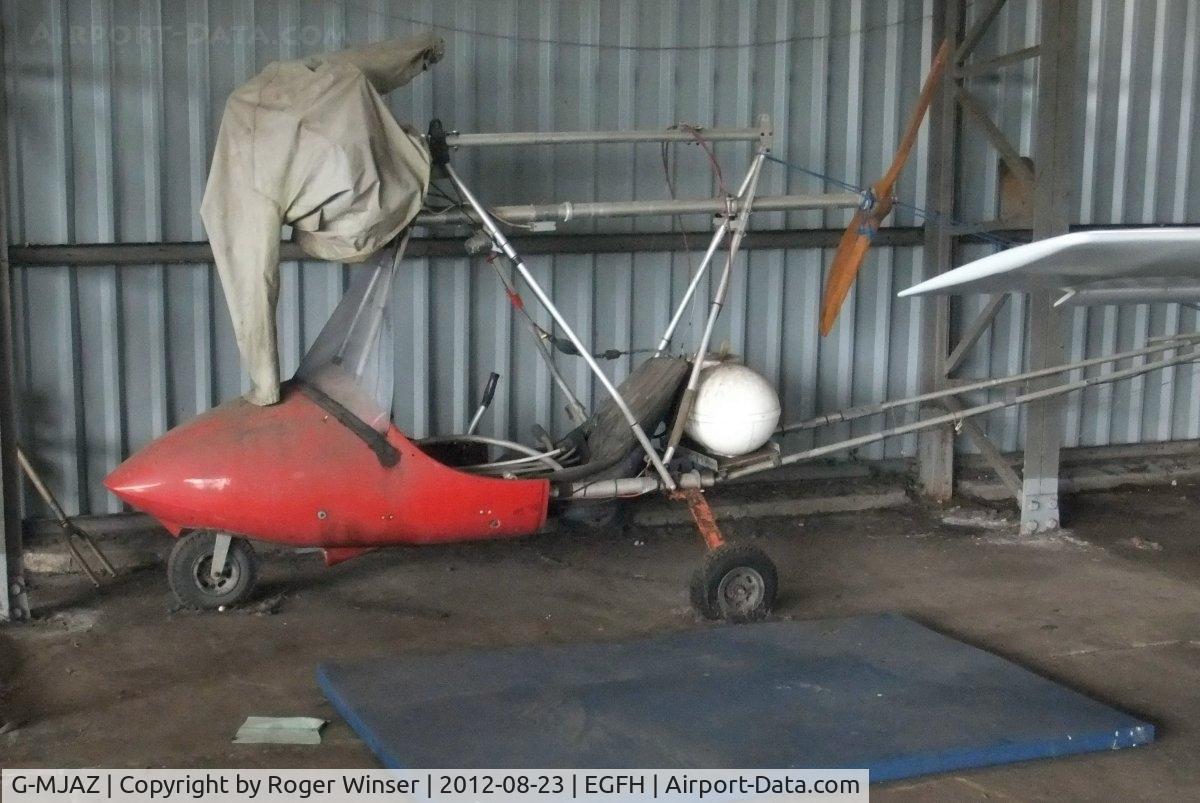 G-MJAZ, 1980 Aerodyne Systems Inc VECTOR 610 C/N 1251, Resident Vector 610. De-registered on 12 April 2010. Previously registered PH-IJI to 20 January1988. Thanks to Paul Wilkinson for establishing the registration of the stored microlight.