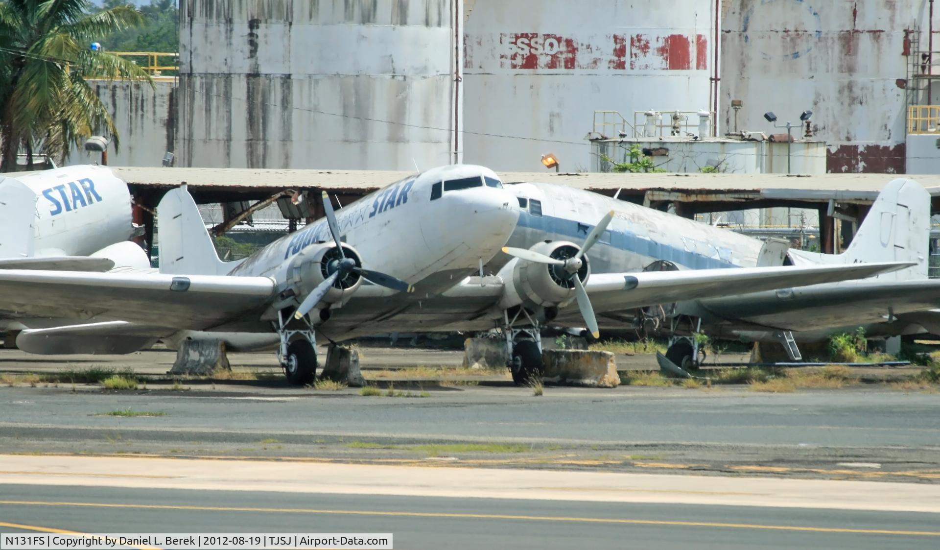 N131FS, 1944 Douglas C-47B-25-DK C/N 16172/32920, Alas, Four Star Cargo is no more; this poor DC-3 is acquiring a coat of mold.  At least she is much better shape than the unfortunate birds in the background.