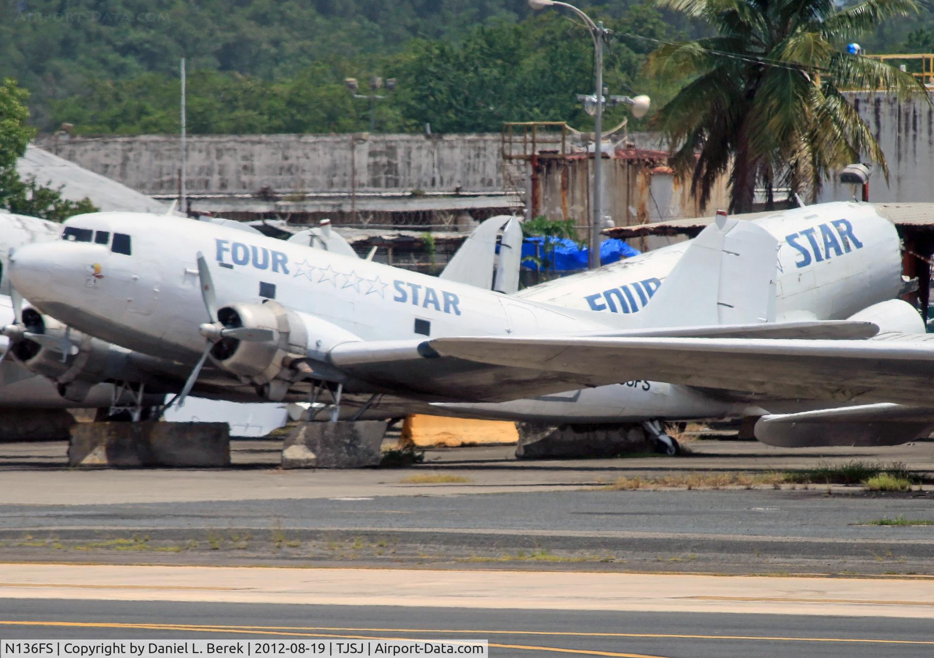 N136FS, 1942 Douglas DC-3 C/N 24405, Ever since a fire broke out in the cockpit in 2009, this DC-3 (in the background, behind N138FS) has never been quite the same.