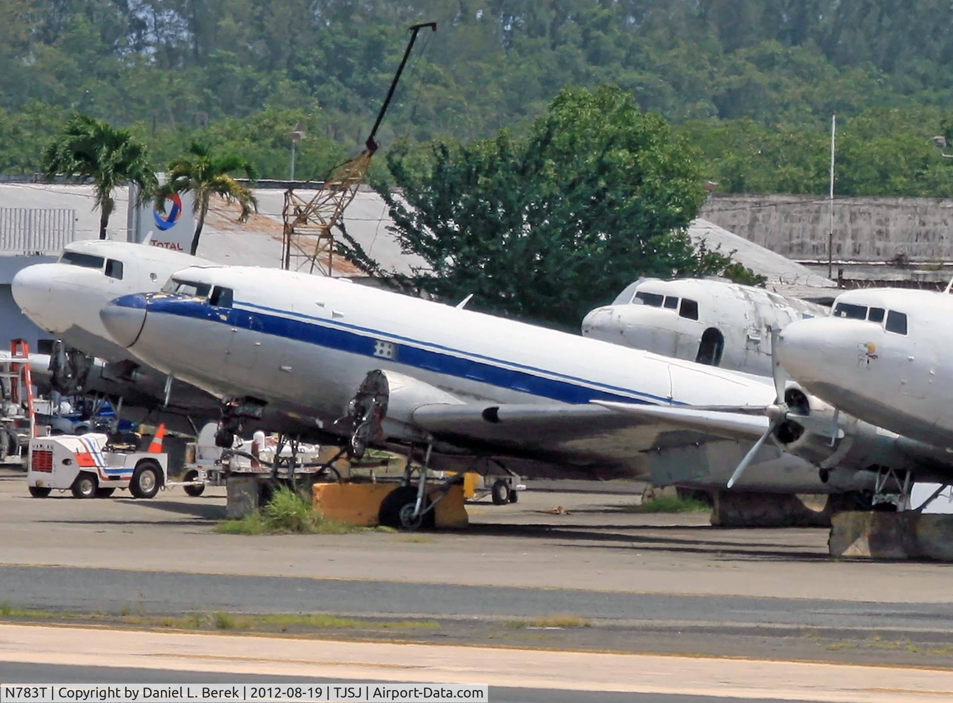 N783T, 1941 Douglas DC3C C/N 4219, Accompanied by unemployed Four Star Cargo DC-3s and bereft of engines, this poor Skytrain (built 1941) won't be going anywhere but will be missed by spotters and propliner enthusiasts throughout the Caribbean.