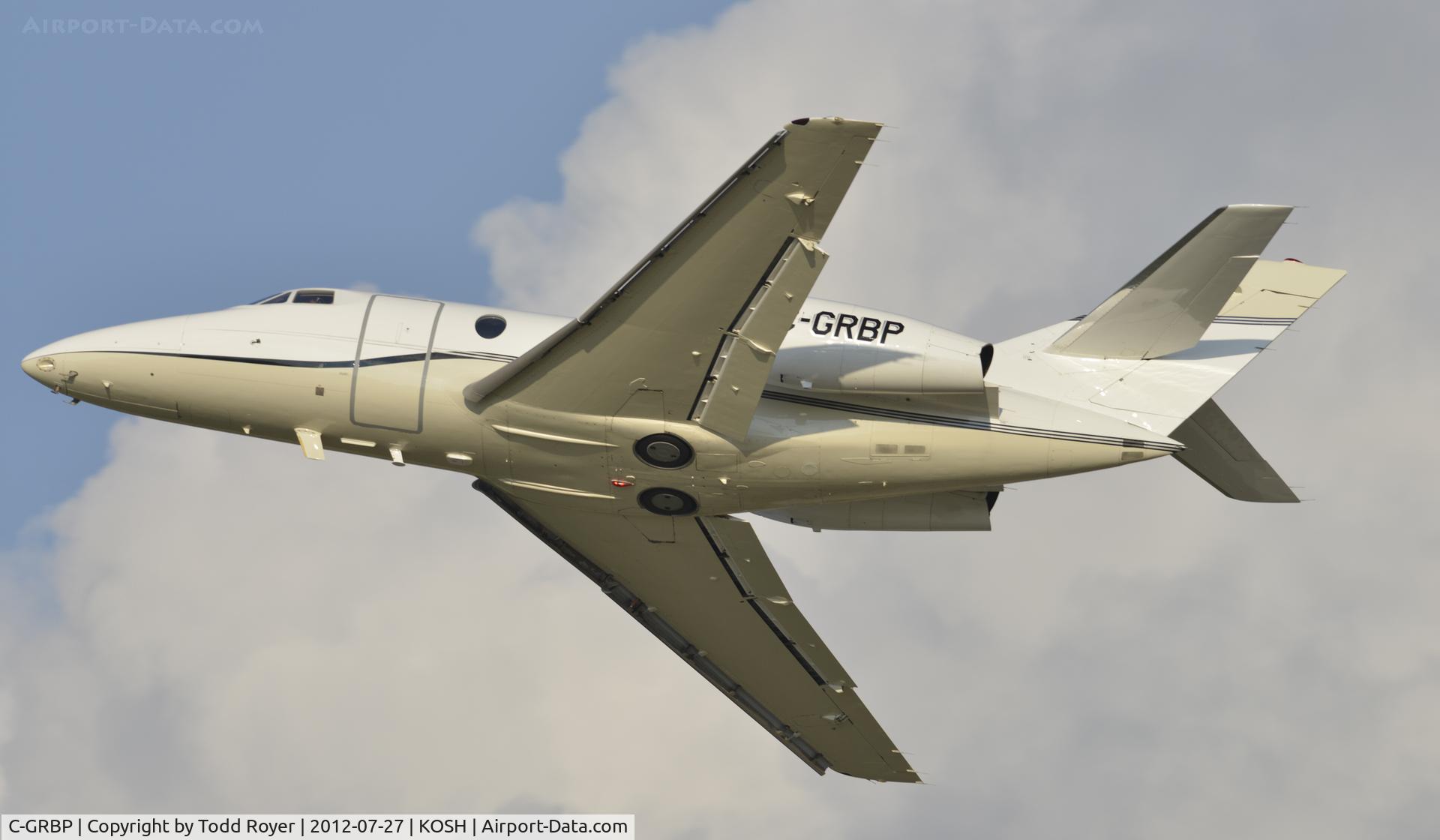 C-GRBP, 1974 Dassault Falcon 10 C/N 23, Departing OSH on runway 36