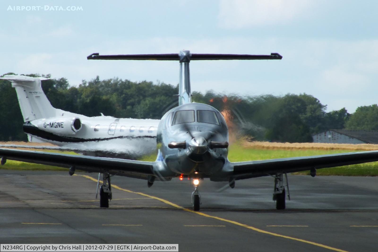 N234RG, 2003 Pilatus PC-12/45 C/N 520, taxiing of the main apron at Oxford, returning to its base at Belfast City Airport, NI