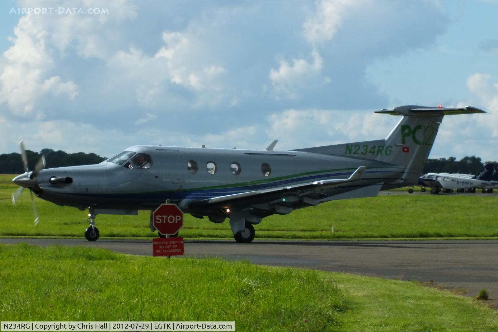 N234RG, 2003 Pilatus PC-12/45 C/N 520, taxiing of the main apron at Oxford, returning to its base at Belfast City Airport, NI