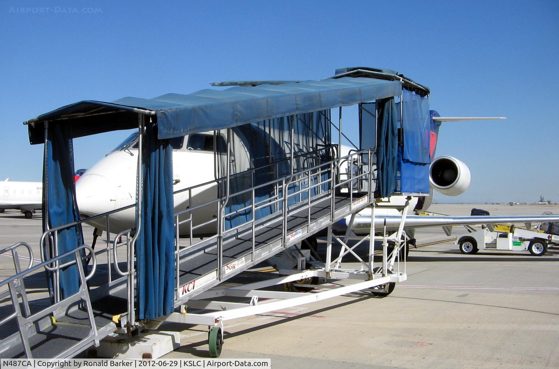 N487CA, 2002 Bombardier CRJ-200ER (CL-600-2B19) C/N 7729, Loading ramp SLC, UT