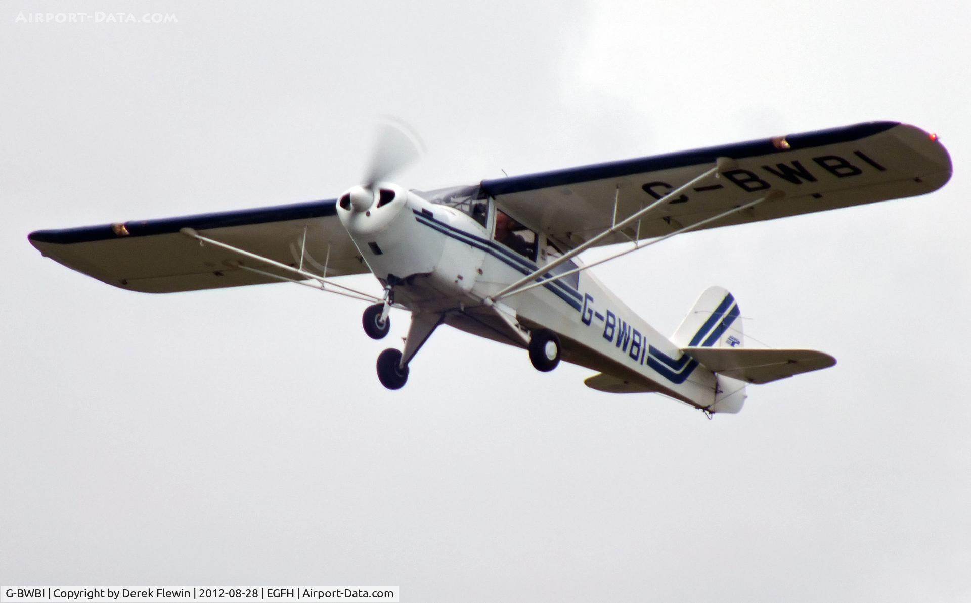 G-BWBI, 1991 Taylorcraft F22A C/N 2207, Climbing out from Rnw 22 at EGFH.