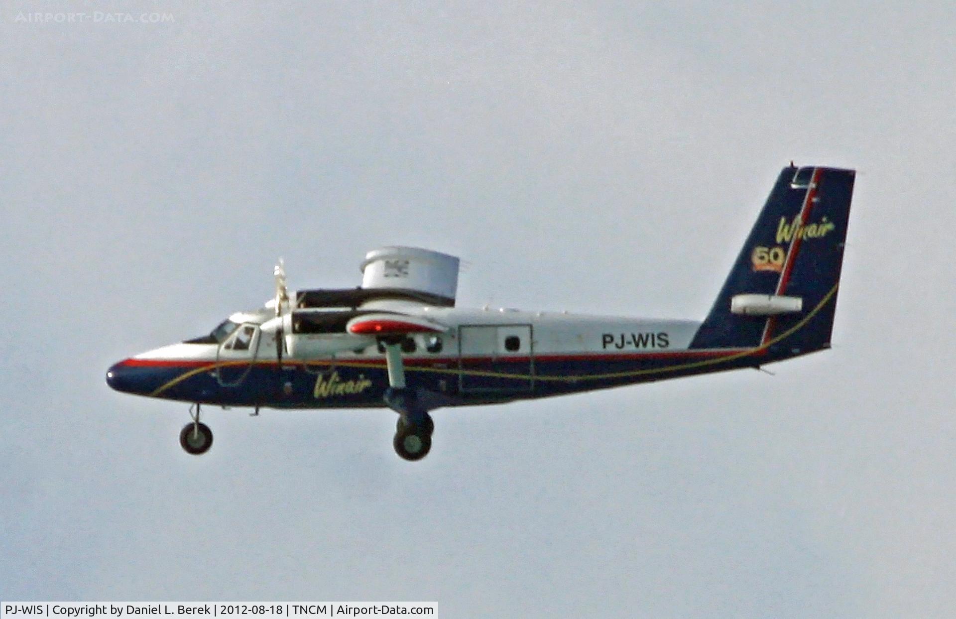 PJ-WIS, 1975 De Havilland Canada DHC-6-300 Twin Otter C/N 447, A Winair Twin Otter taking off from SXM 
makes a high-level pass over the cruise ship docks.