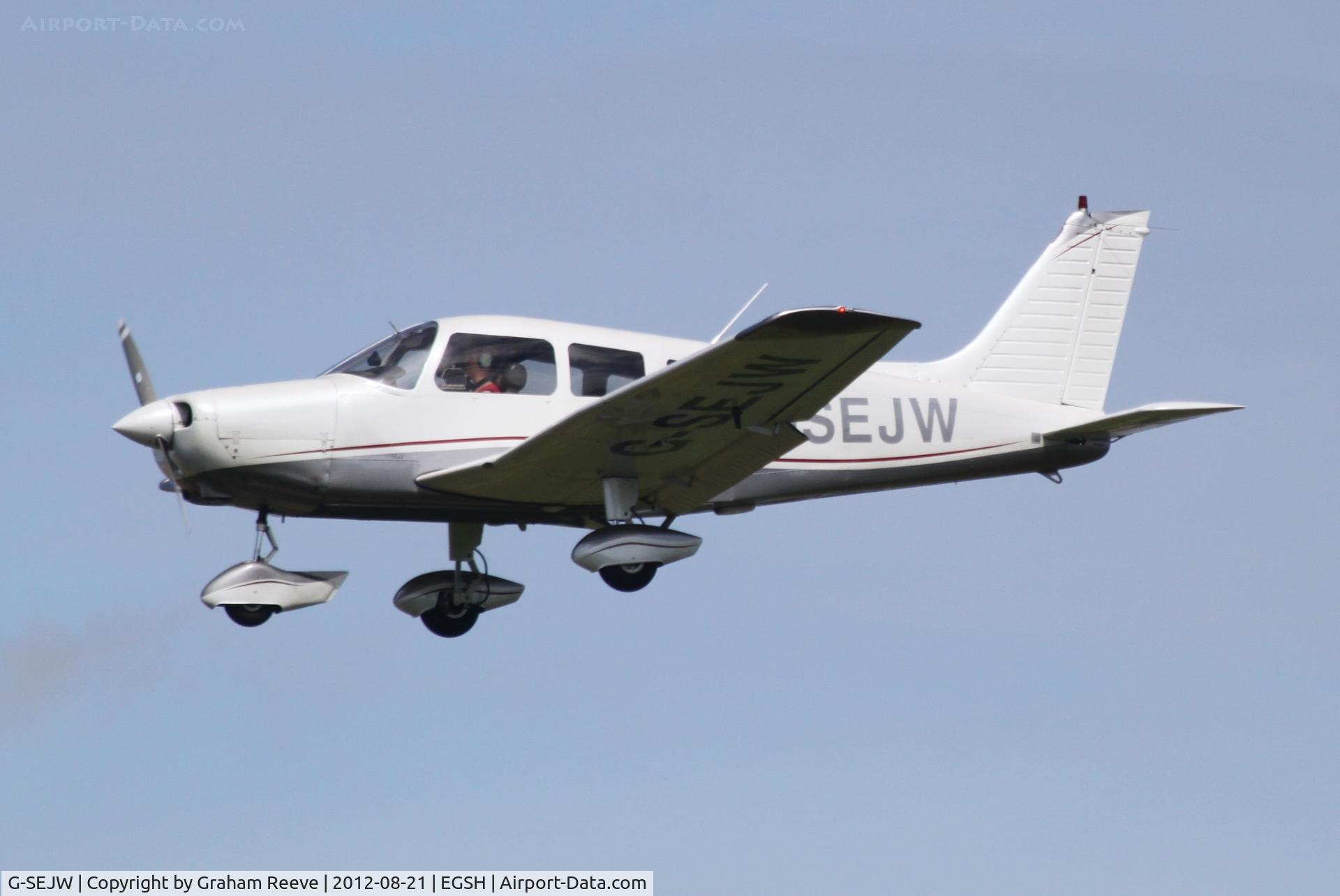 G-SEJW, 1978 Piper PA-28-161 Cherokee Warrior II C/N 28-7816469, About to land.