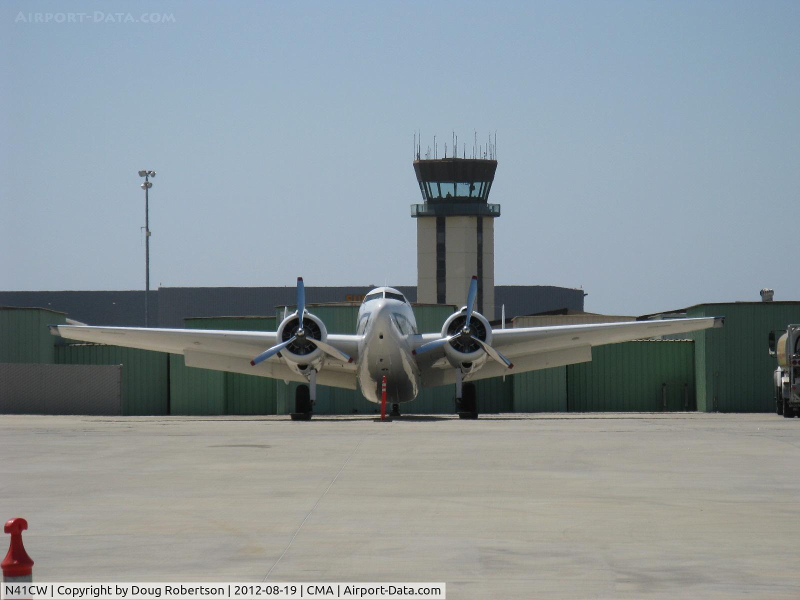 N41CW, 1954 Lockheed 18-56 Lodestar C/N 6124, 1954 Lockheed 18-56 LODESTAR modified, two Wright C9HD 1,425 Hp each upgrade radials, CMA Tower in distance
