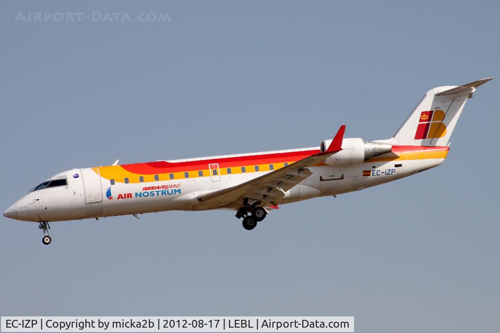 EC-IZP, 2004 Bombardier CRJ-200ER (CL-600-2B19) C/N 7950, Landing in 25R