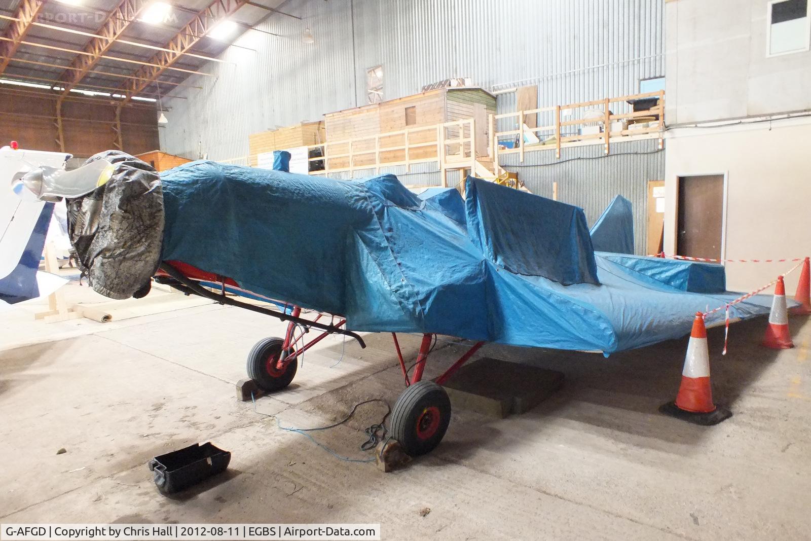 G-AFGD, 1937 British Aircraft Manufacturing Company Ltd Swallow L25C MK.2 C/N 469, kept well under wraps