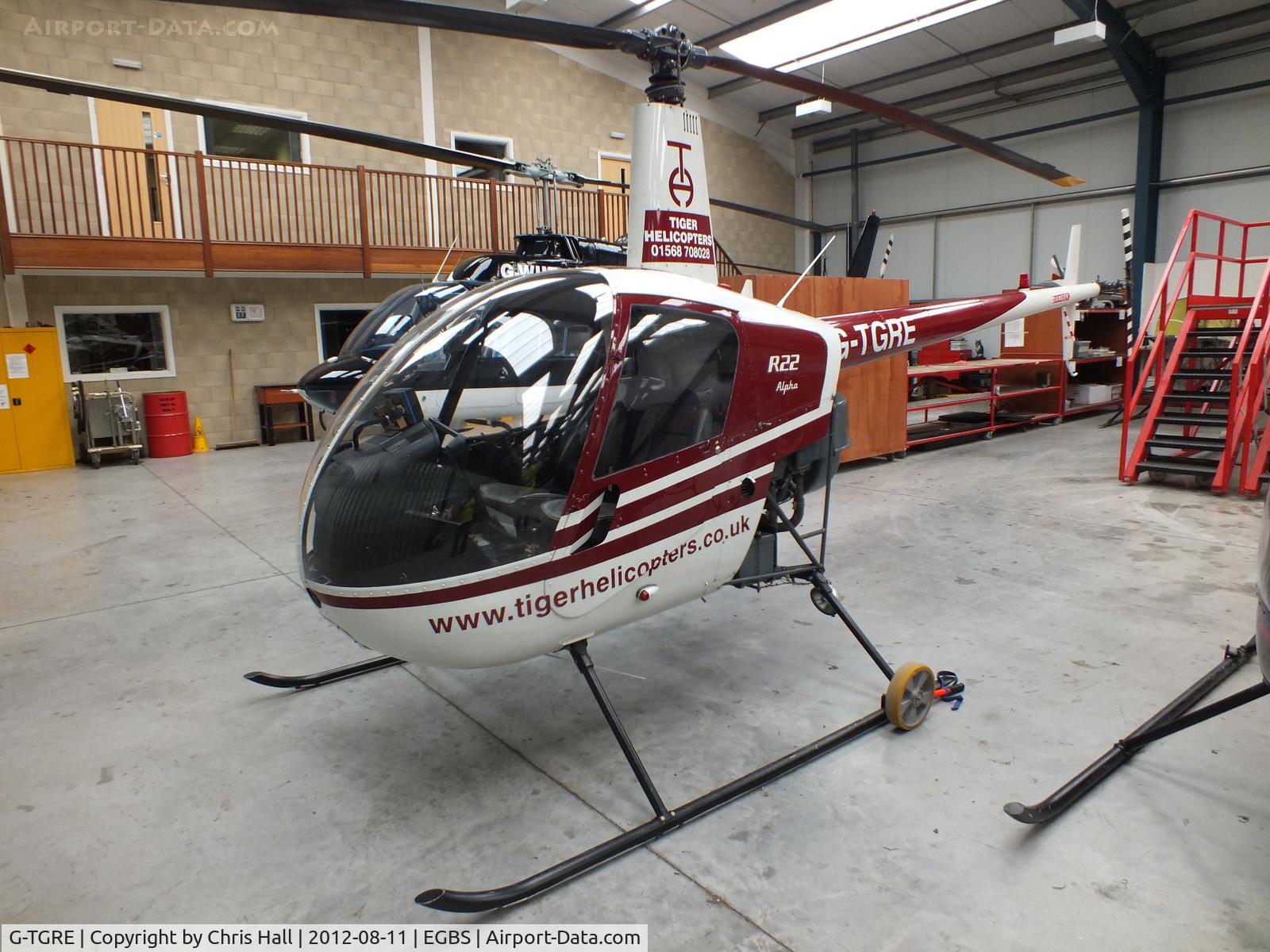 G-TGRE, 1985 Robinson R22 Alpha C/N 0471, inside the Tiger Helicopter's Hangar at Shobdon Airfield, Herefordshire