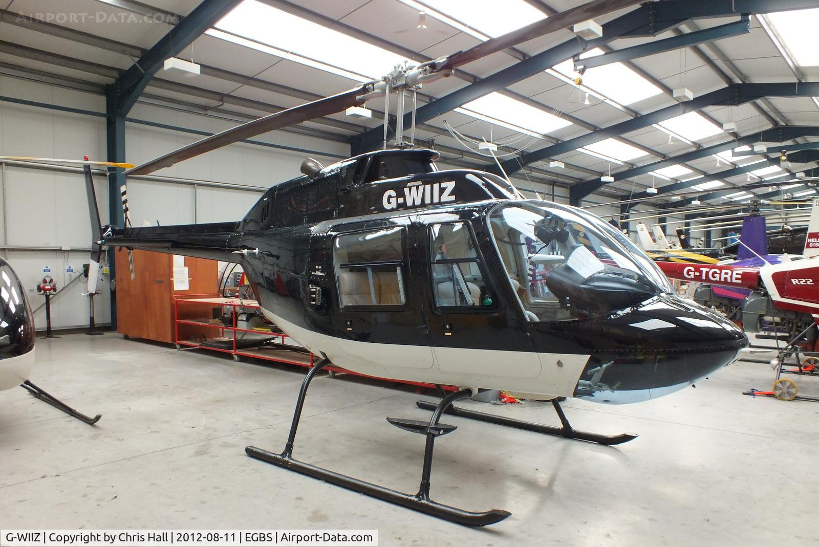 G-WIIZ, 1969 Agusta AB-206B JetRanger II C/N 8111, inside the Tiger Helicopter's Hangar at Shobdon Airfield, Herefordshire