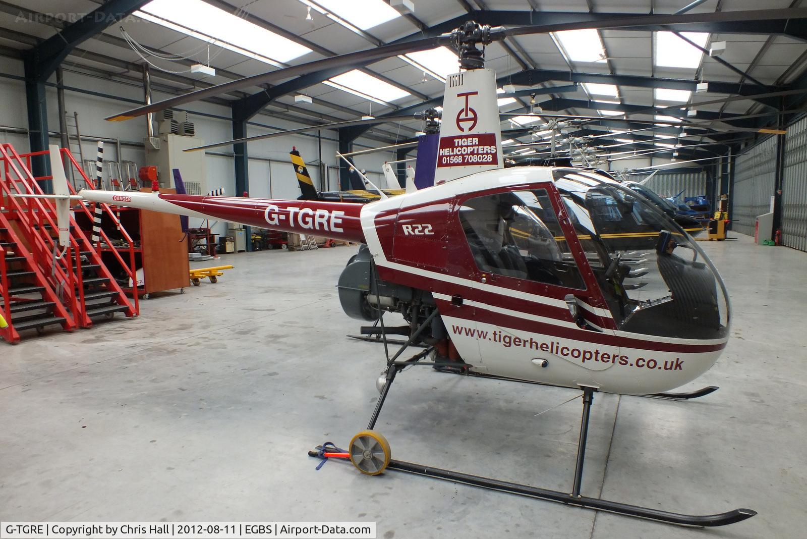 G-TGRE, 1985 Robinson R22 Alpha C/N 0471, inside the Tiger Helicopter's Hangar at Shobdon Airfield, Herefordshire