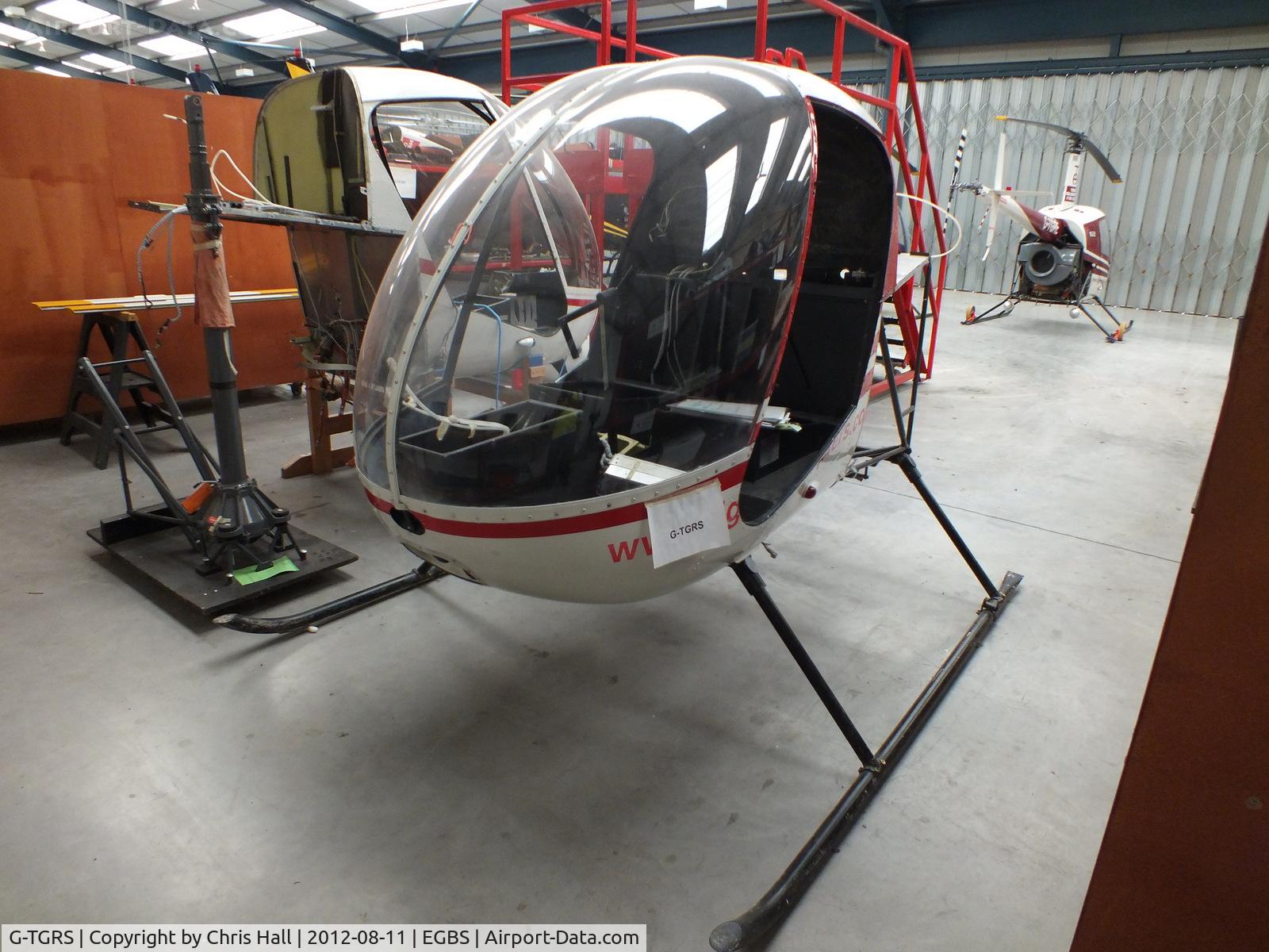 G-TGRS, 1989 Robinson R22 Beta C/N 1069, inside the Tiger Helicopter's Hangar at Shobdon Airfield, Herefordshire