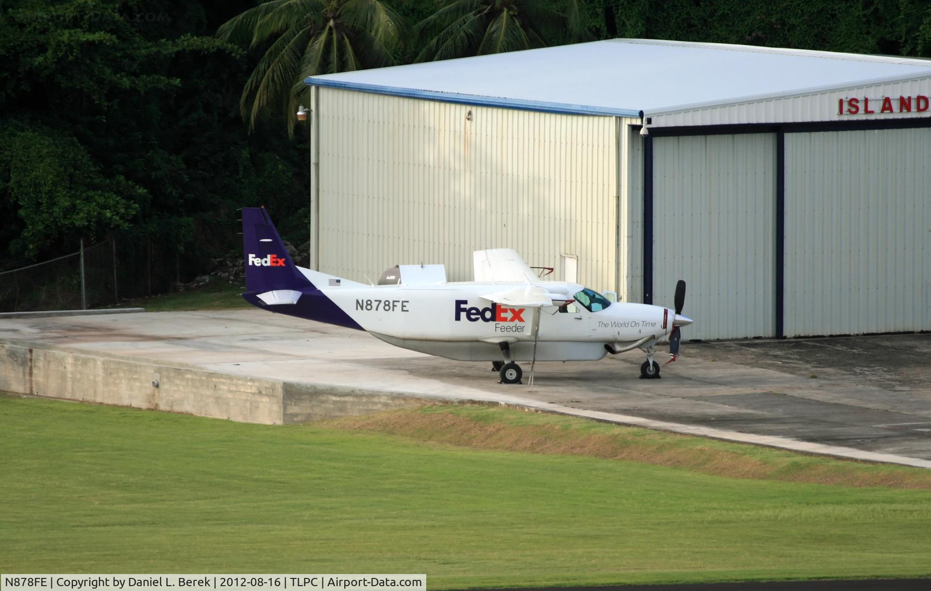 N878FE, 1990 Cessna 208B C/N 208B0211, A FedEx (Mountain Air Cargo) Cessna Super Cargomaster awaits its next shipment of parcels to Florida or another Caribbean destination.