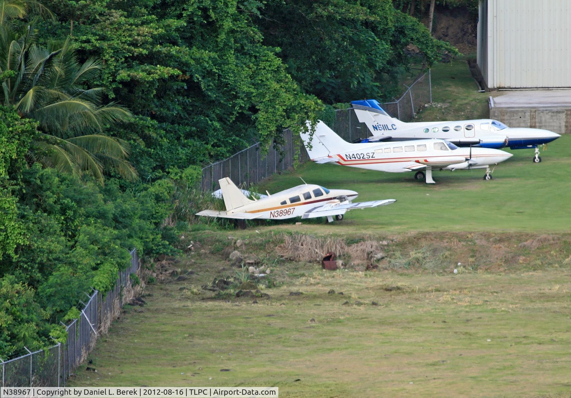 N38967, 1977 Piper PA-34-200T C/N 34-7770355, Bereft of its engines, this poor Piper has been sitting at this airport for quite a while.  Its owner, 