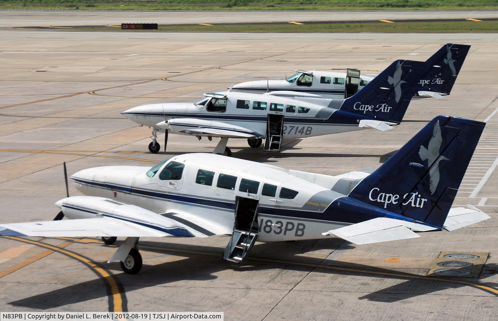 N83PB, 1980 Cessna 402C C/N 402C0350, A Cape Air Cessna 402C heads a line-up of sisterships at San Juan.