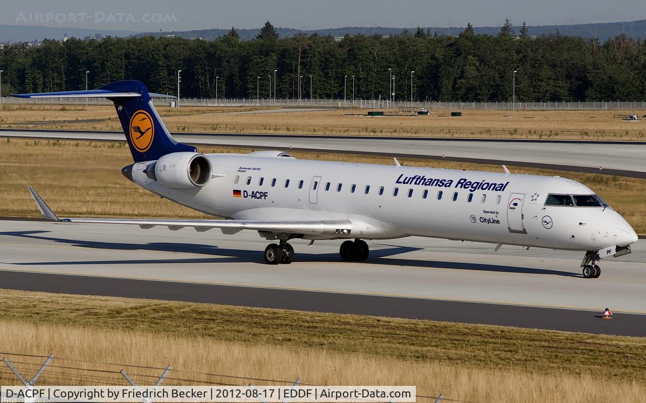 D-ACPF, 2001 Canadair CRJ-701ER (CL-600-2C10) Regional Jet C/N 10030, taxying to the gate