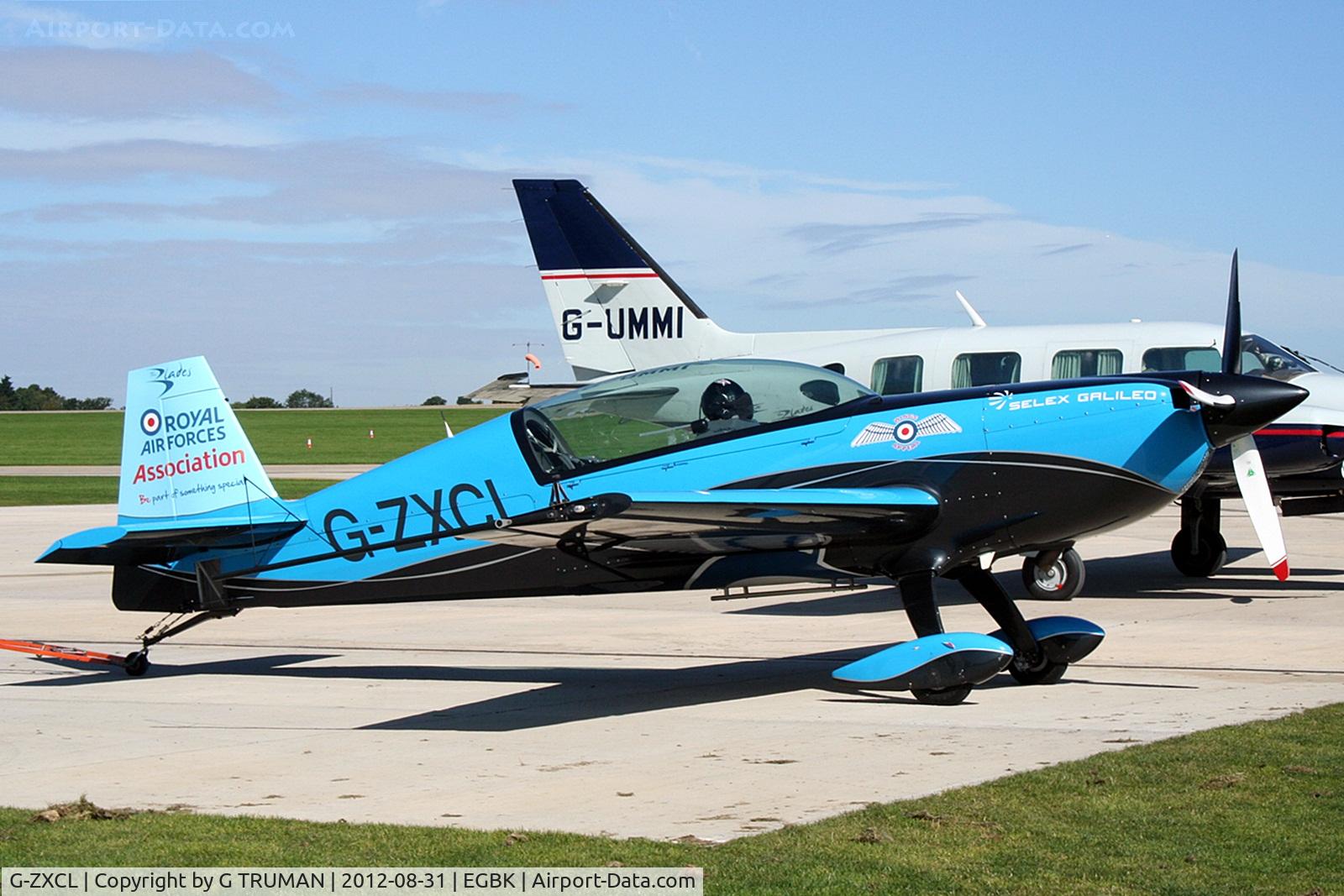 G-ZXCL, 2006 Extra EA-300L C/N 1223, Out in the sun at its home base