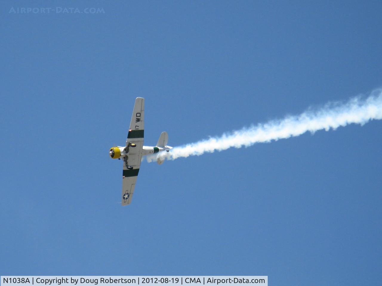 N1038A, 1944 North American SNJ-5 Texan C/N 90917 (121-41633), 1944 North American SNJ-5 War Dog, P&W R-1340 Wasp 600 Hp, low level aerobatics with smoke