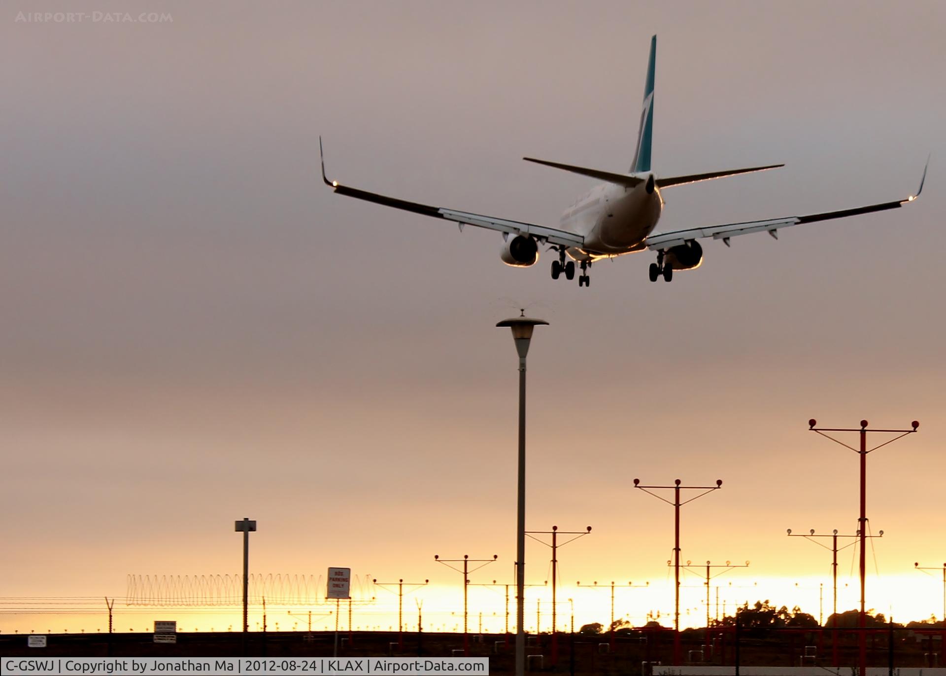 C-GSWJ, 2010 Boeing 737-7CT C/N 37423, Flying off into the sunset!