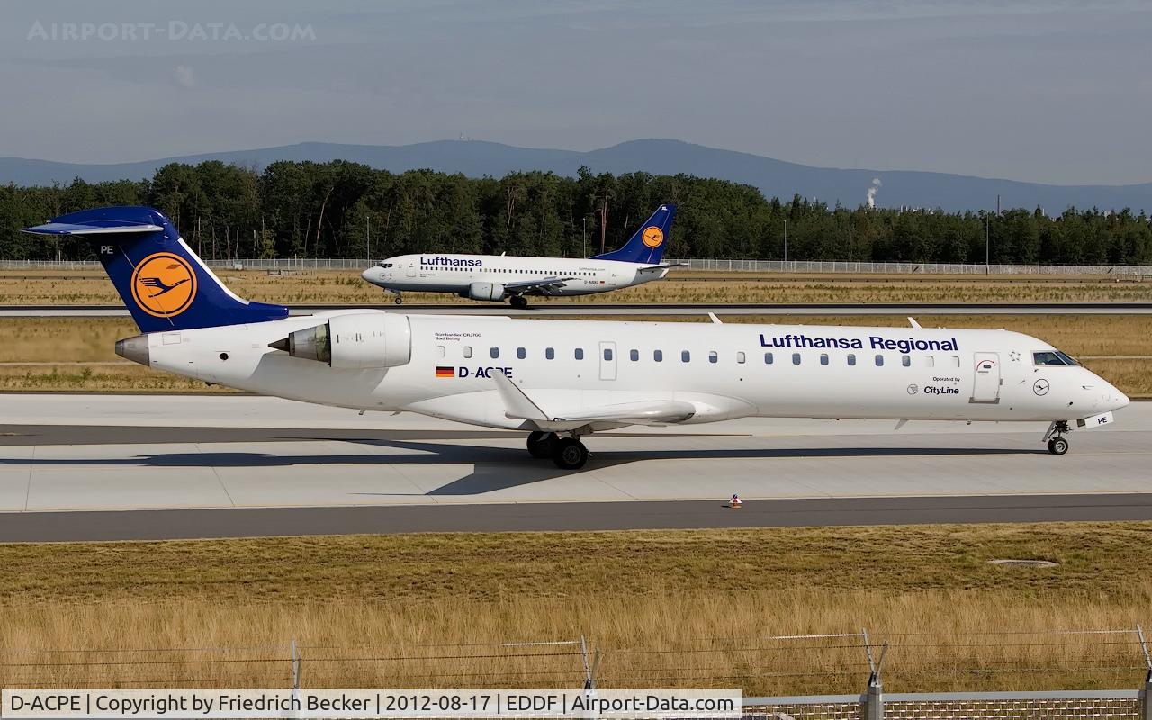 D-ACPE, 2001 Bombardier CRJ-701ER (CL-600-2C10) Regional Jet C/N 10027, taxying to the gate