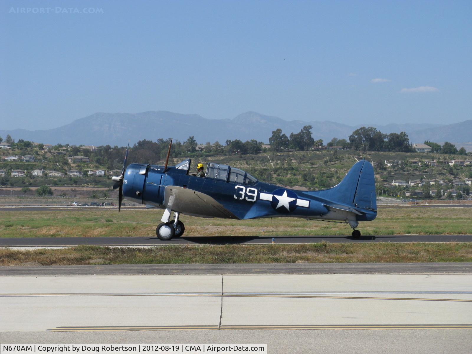 N670AM, 1993 Douglas SBD-5 Dauntless C/N 28536, 1993 Douglas/Maloney SBD-5 DAUNTLESS dive bomber, Wright R-1820 Cyclone 9 cylinder radial 1,200 Hp, taxi to 26, a real rarity among extant warbirds