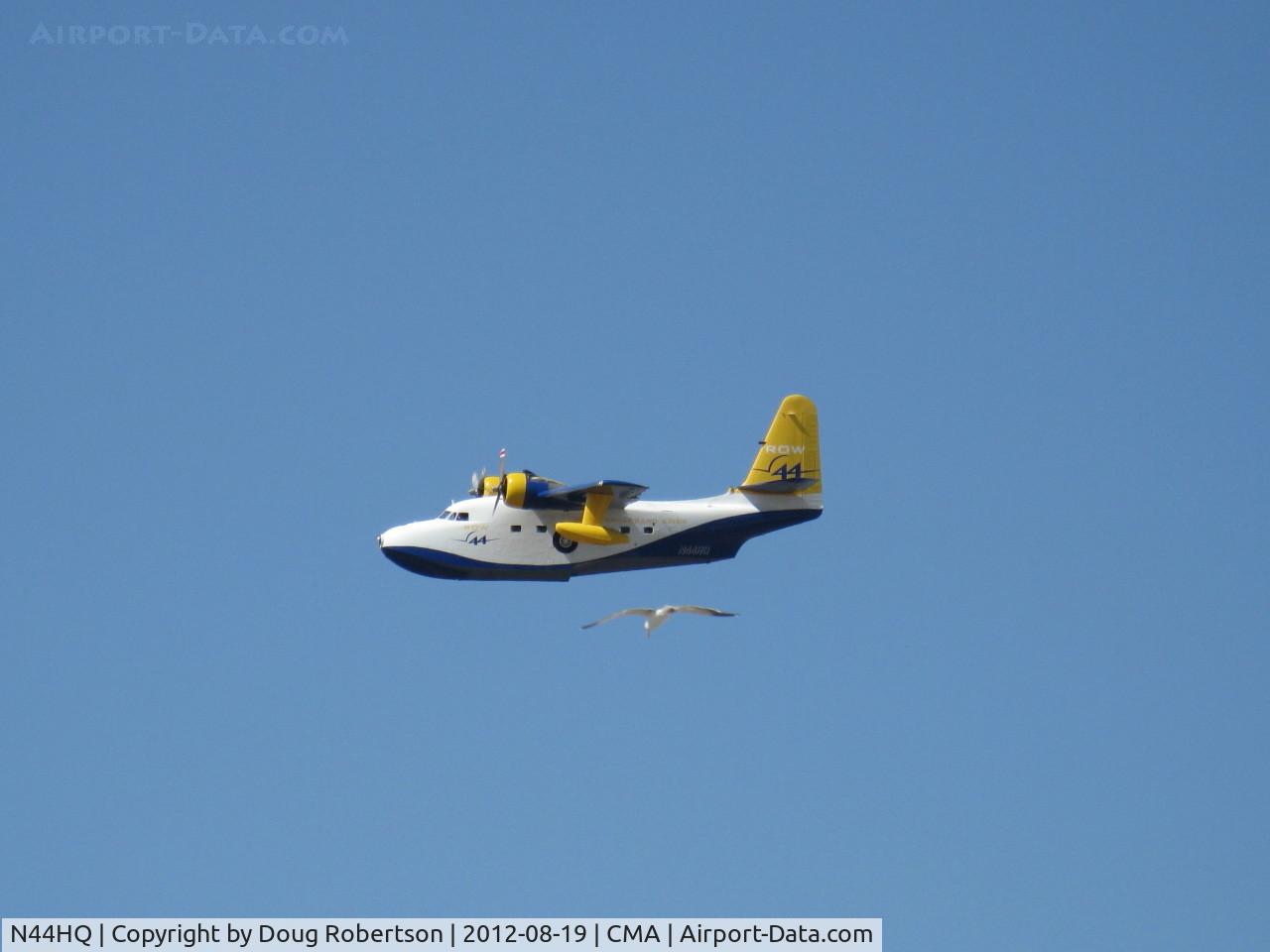 N44HQ, 1950 Grumman HU-16B Albatross C/N G-99, 1950 Grumman HU-16B ALBATROSS 'Row 44', 2 Wright R-1820-76A 1,425 Hp each, overflight Rwy 26 with B1-RD at 9 o'clock low. Row 44 is largest satellite-deployed broadband WI-FI supplier of in-flight Internet service. Named after airline bad seat experience.