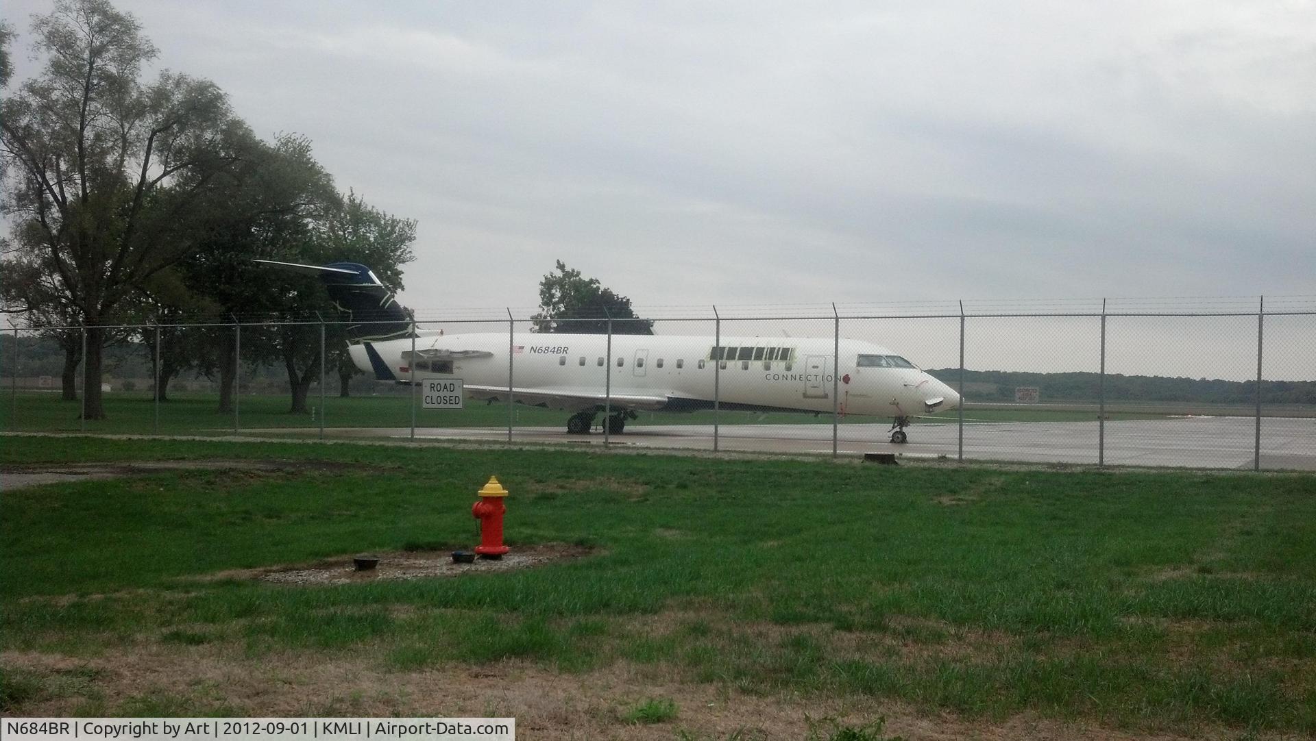 N684BR, 2002 Bombardier CRJ-200ER (CL-600-2B19) C/N 7708, Parked at the Ramp at KMLI ??? Minus Engines and Logos covered up