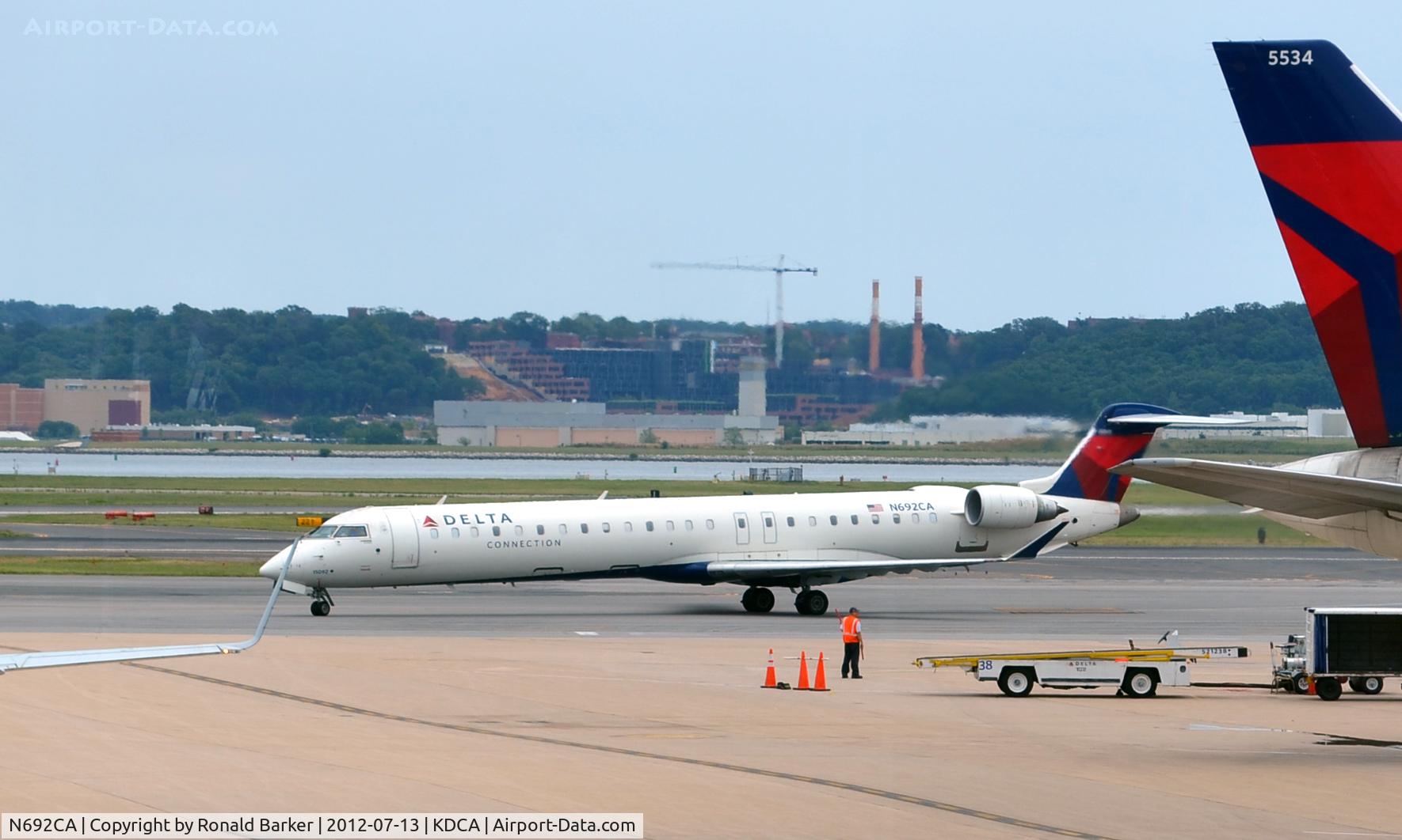 N692CA, 2006 Bombardier CRJ-900ER (CL-600-2D24) C/N 15092, Taxi DCA