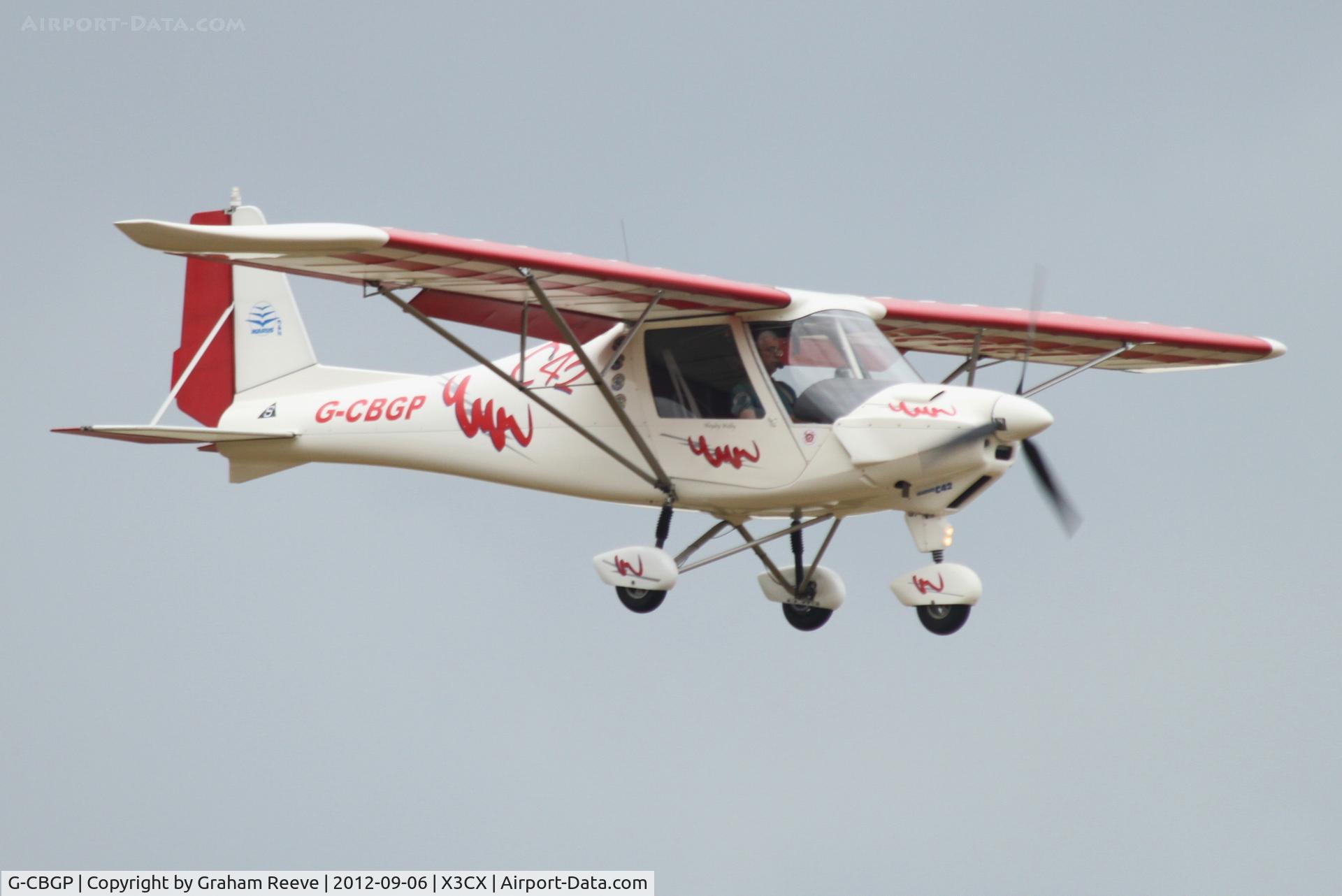 G-CBGP, 2001 Comco Ikarus C42 FB UK C/N PFA 322-13741, About to touch down.
