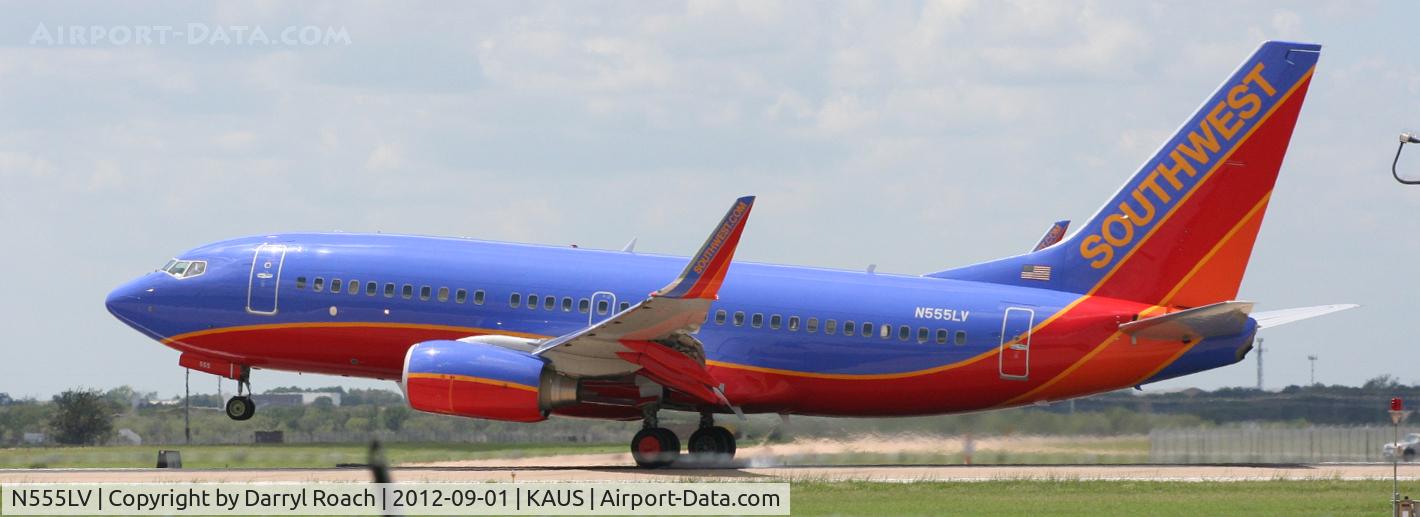 N555LV, 2011 Boeing 737-7BD C/N 36726, SWA B737 smokes 'em on 17L.
