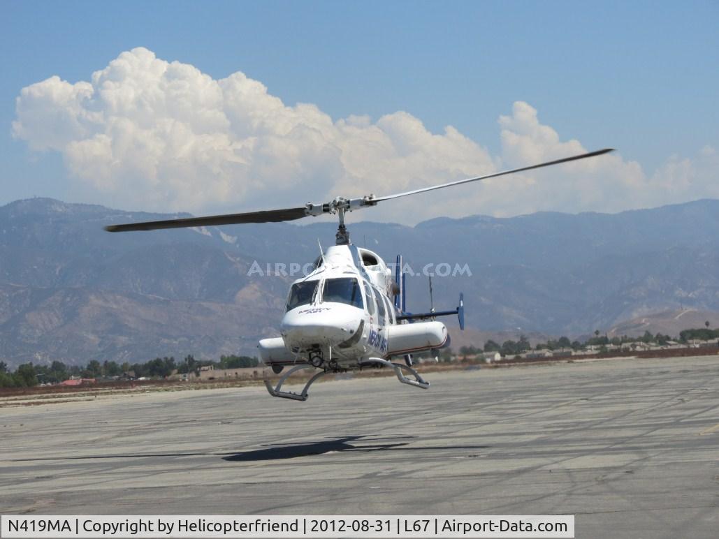 N419MA, 1984 Bell 222UT C/N 47518, Gently setting the ship down
