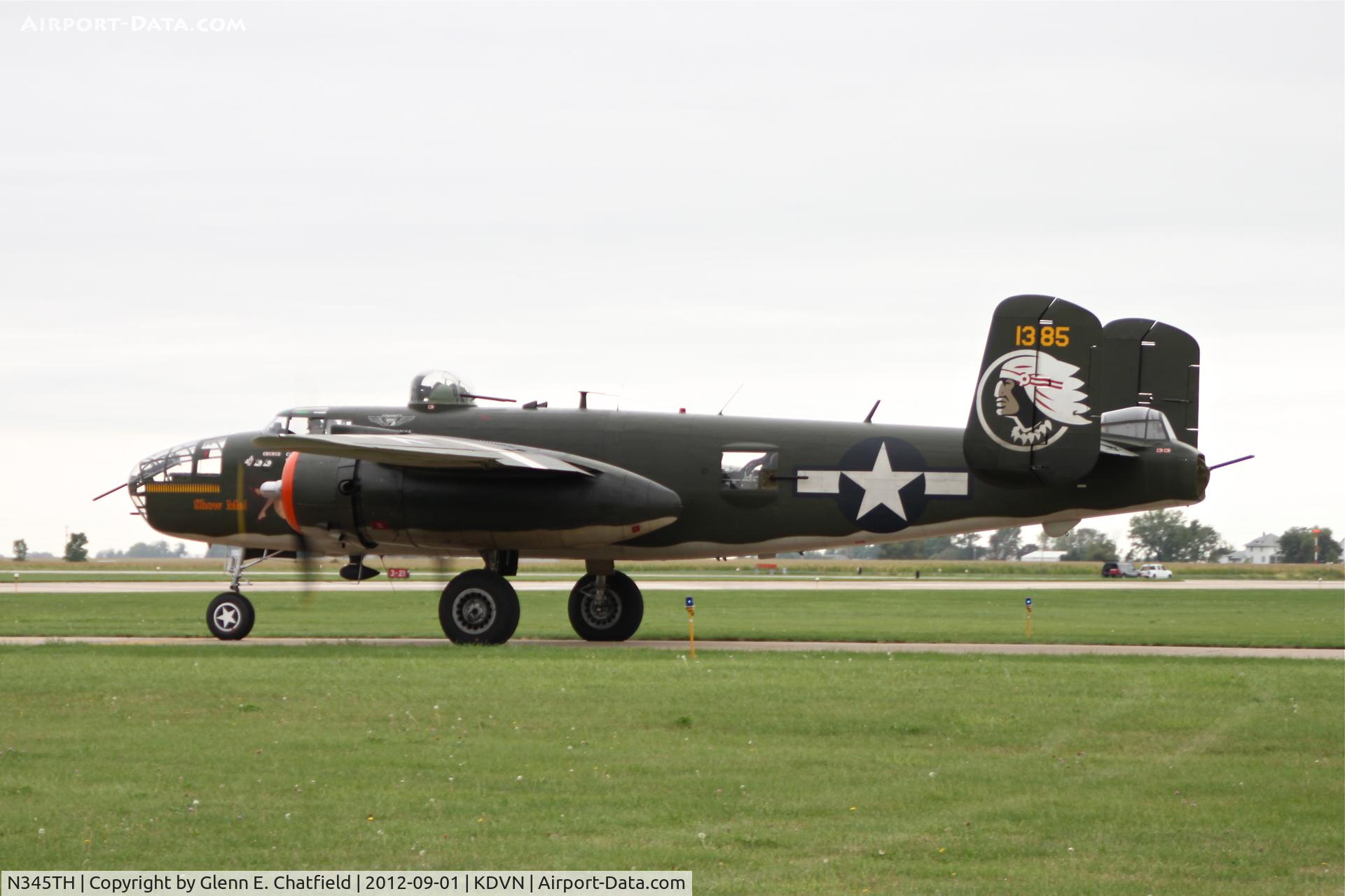 N345TH, 1944 North American TB-25J Mitchell C/N 44-31385A, Taxiing out for flying demonstration.  Quad Cities Air Show.  Overcast and sprinkles.