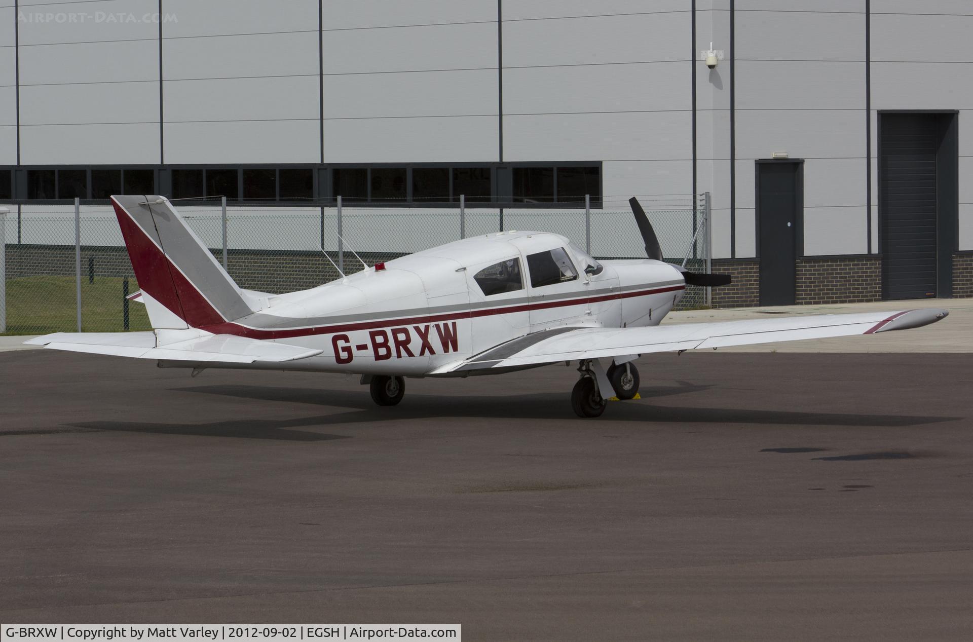 G-BRXW, 1964 Piper PA-24-260 Comanche C/N 24-4069, Sat on stand at SaxonAir.