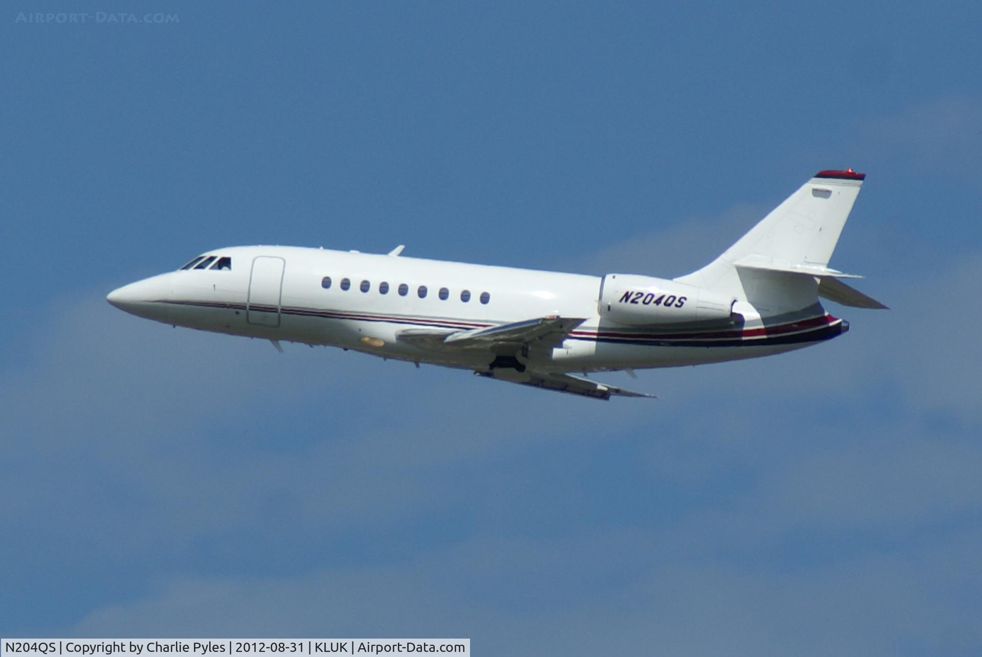 N204QS, 1999 Dassault Falcon 2000 C/N 104, Netjets flies a lot out of KLUK and the morning sun made a pretty nice shot of this one. 