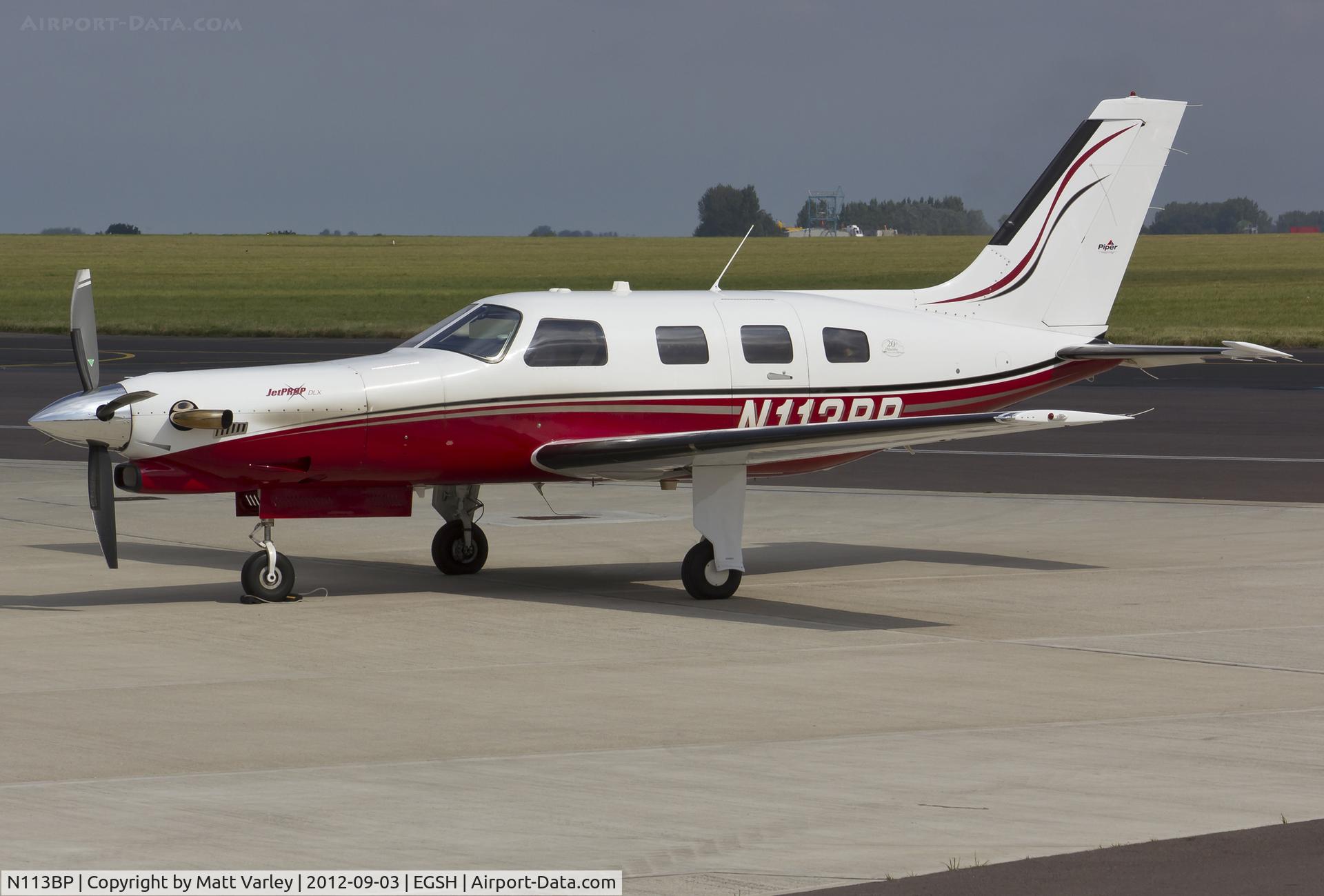 N113BP, 2004 Piper PA-46-350P Malibu Mirage C/N 4636363, Sat on stand at SaxonAir.