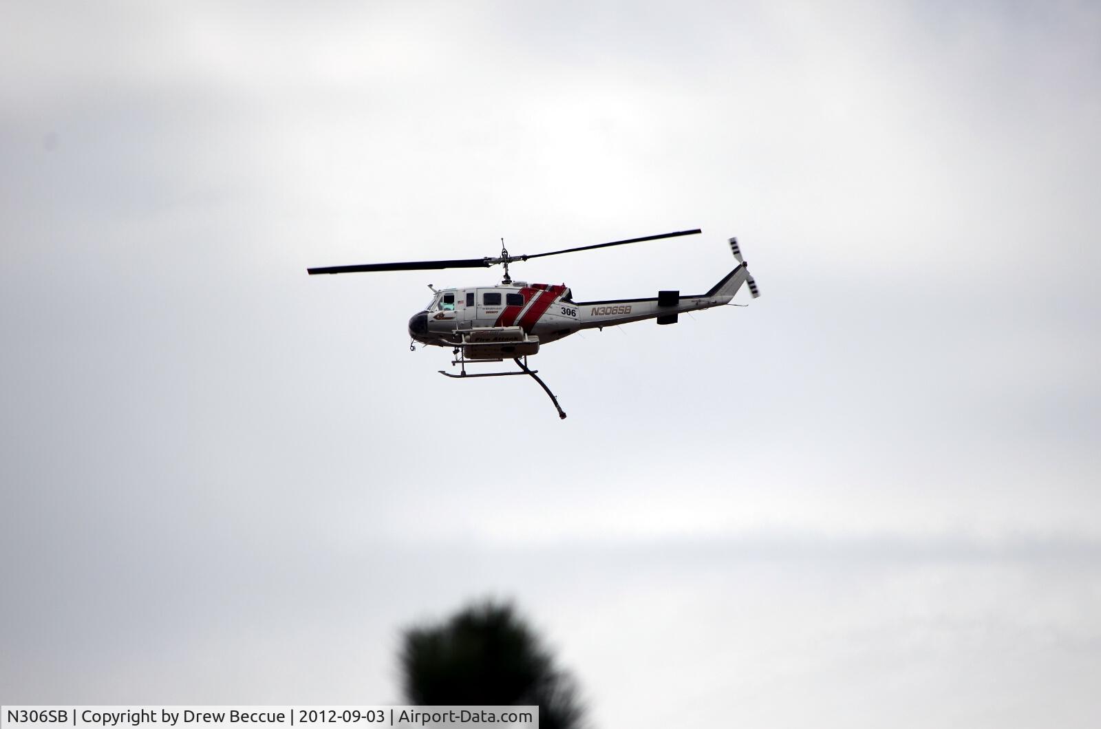 N306SB, 1971 Bell UH-1H Iroquois C/N 13041, Flying as part of firefighting efforts in Lockwood Valley, CA on 9/3/12