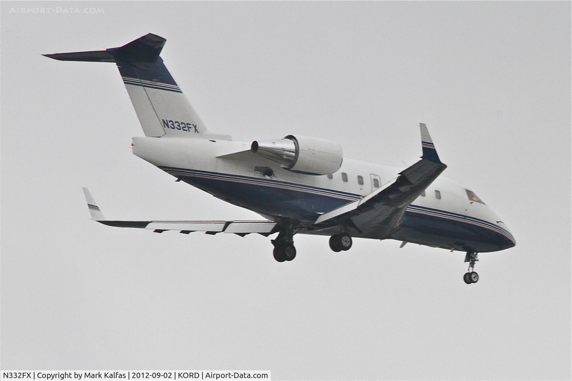 N332FX, 2002 Bombardier Challenger 604 (CL-600-2B16) C/N 5543, Bombardier CL-600-2B16, N332FX arriving from 	Cherry Capital/KTVC, RWY 10 approach KORD.