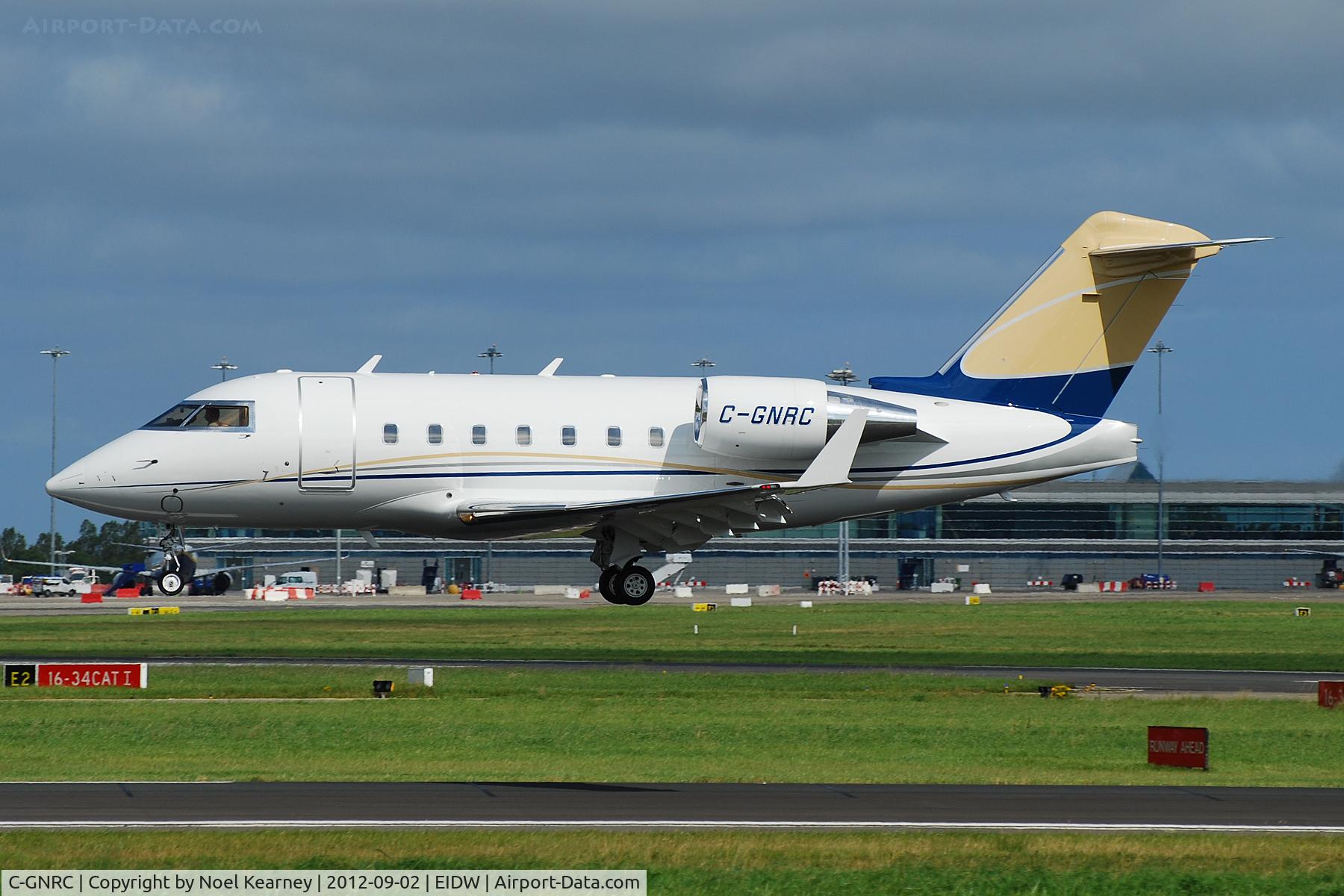C-GNRC, 1999 Bombardier Challenger 604 (CL-600-2B16) C/N 5417, Landing Rwy 28 at EIDW