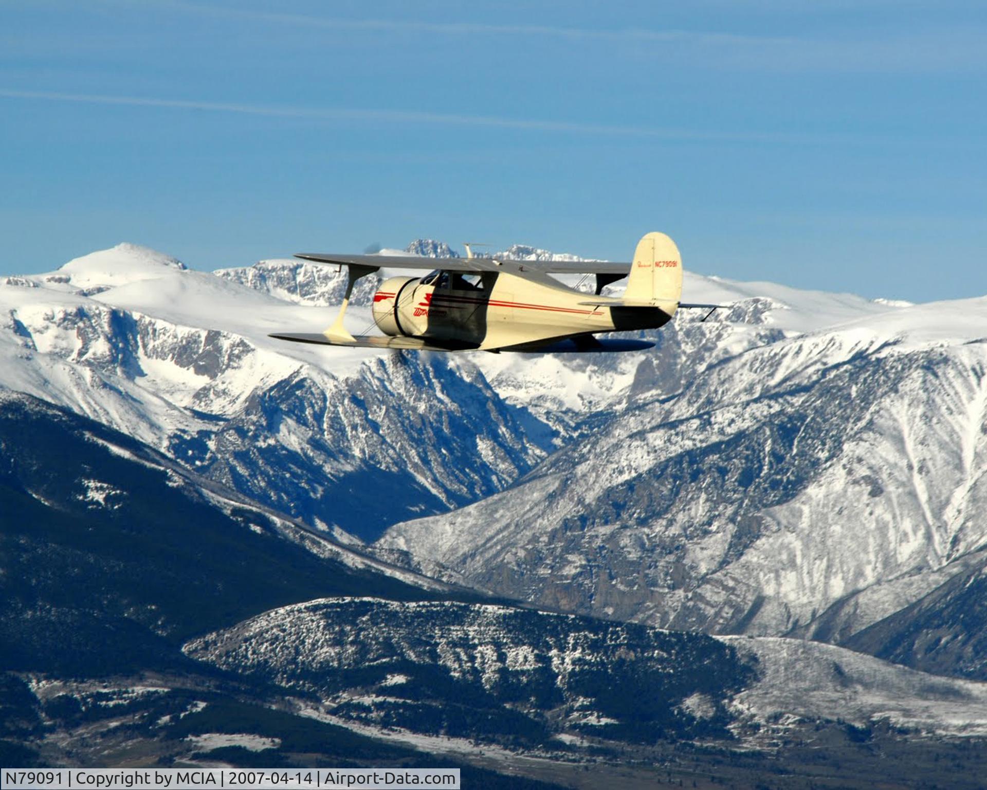 N79091, 1941 Beech D17S Staggerwing C/N 1020, N79091 over mountain range