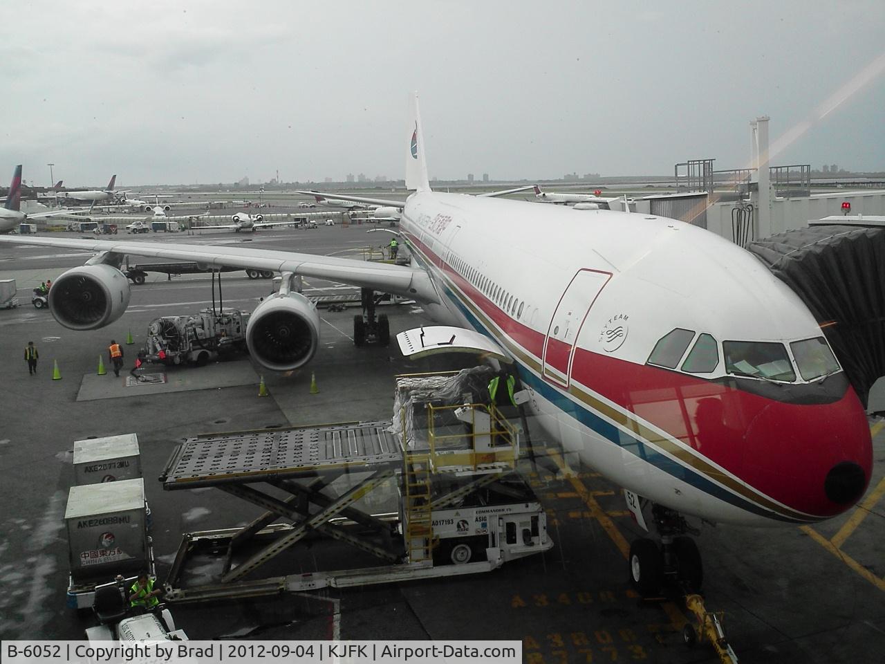 B-6052, 2003 Airbus A340-642 C/N 514, at gate 8 at JFK just before departure