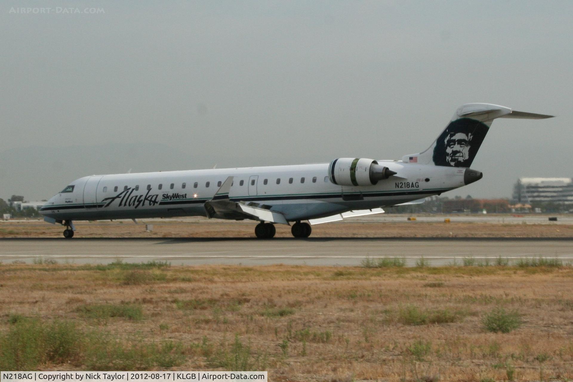 N218AG, 2005 Canadair CL-600-2C10 Regional Jet CRJ-700 C/N 10205, Landing rollout Rwy 30