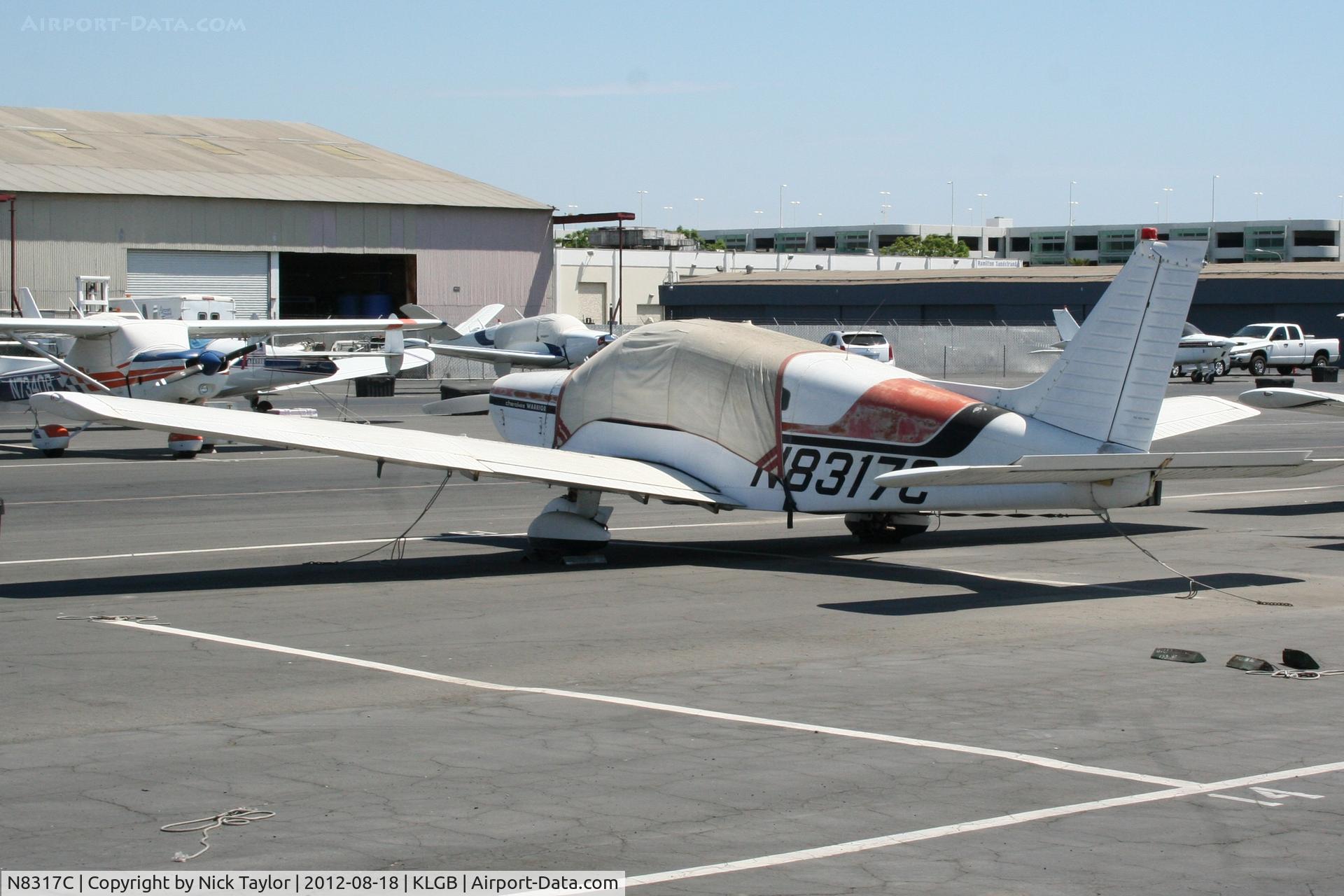 N8317C, 1975 Piper PA-28-151 C/N 28-7615086, Parked on the north ramp