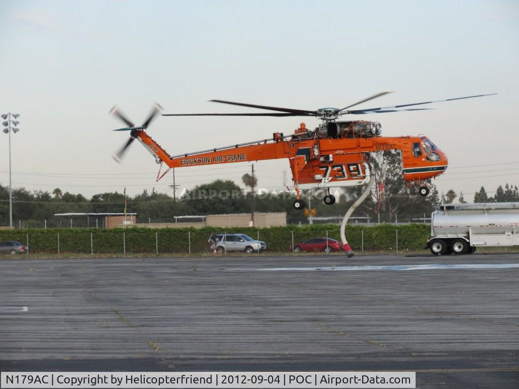 N179AC, 1970 Sikorsky S-64F Skycrane C/N 64091, Elvis gentliy sets the snorkel down