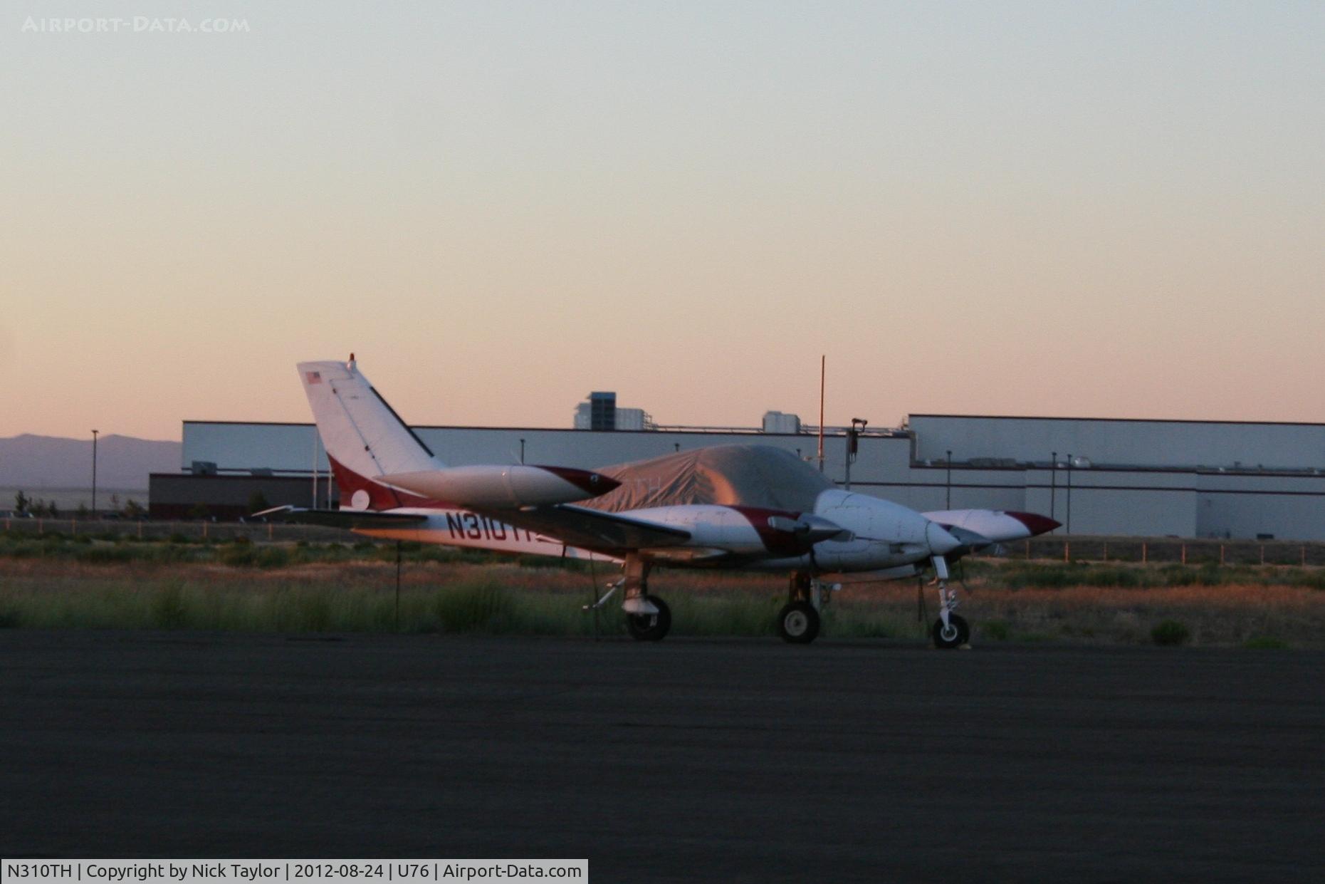 N310TH, 1968 Cessna 310N C/N 310N-0003, Parked on the ramp.