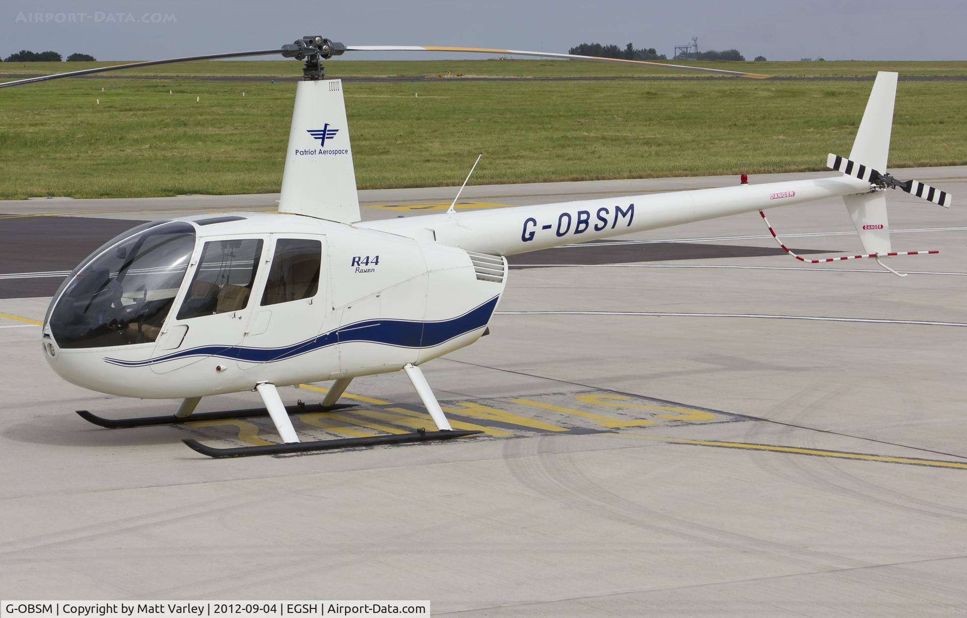 G-OBSM, 2001 Robinson R44 Raven C/N 1030, Sat on stand at SaxonAir.